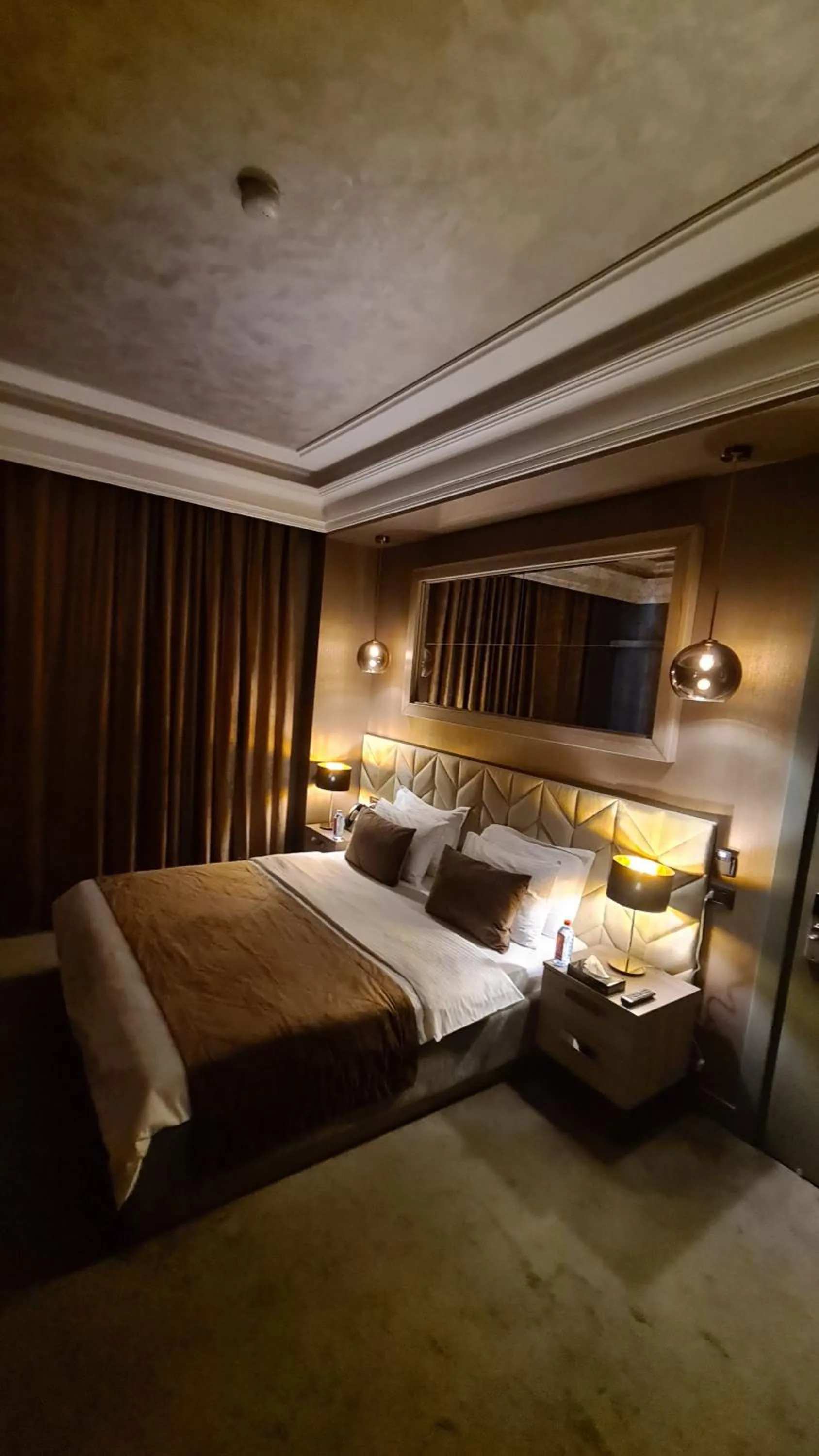 Bed in Home Boutique Hotel