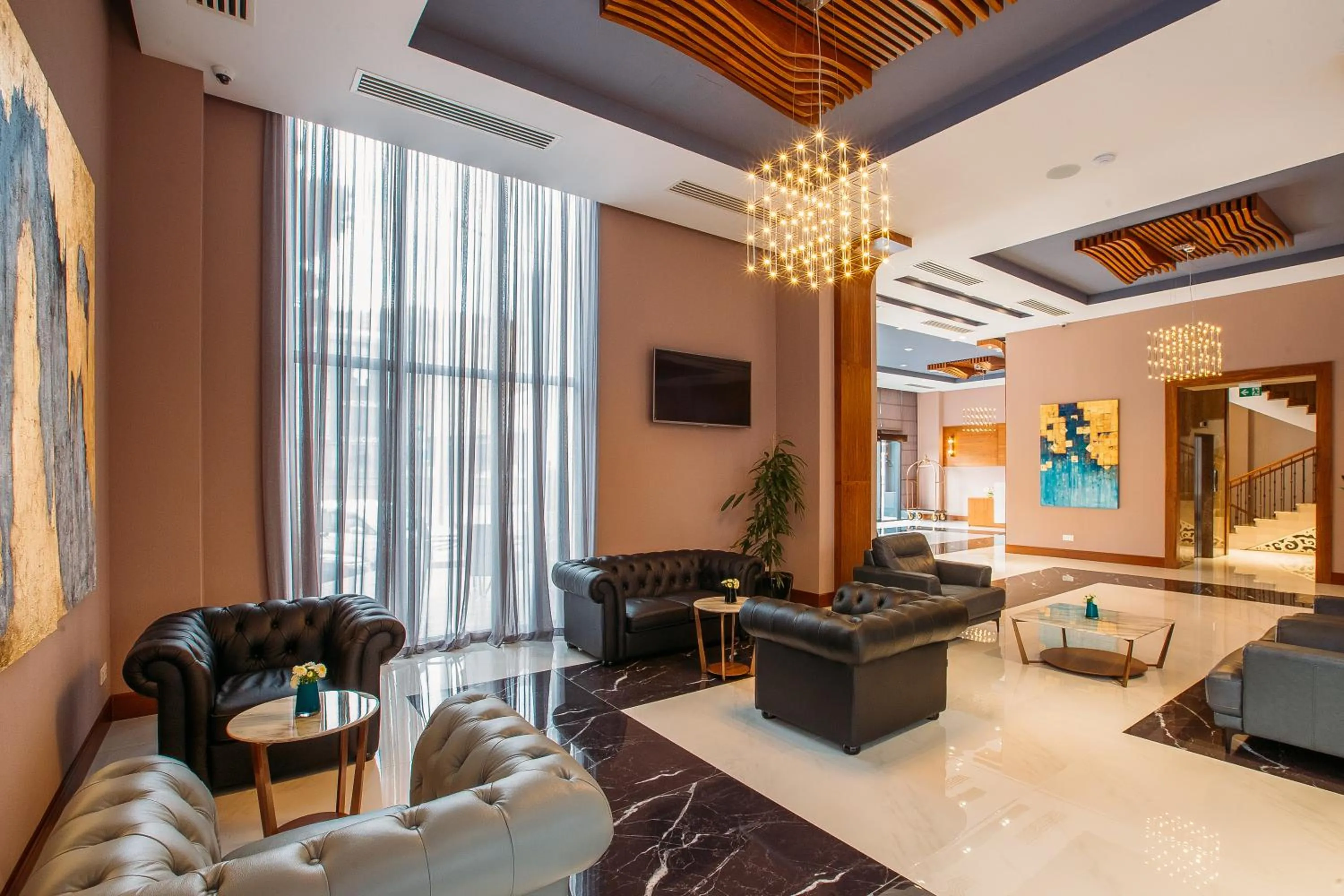 Communal lounge/ TV room in Horizont Hotel Tbilisi