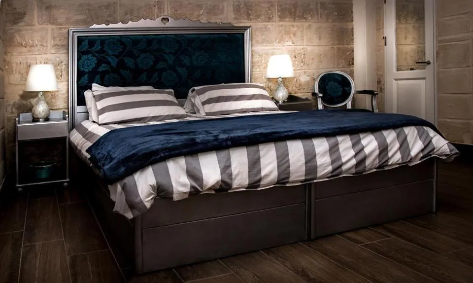 Bed in Luciano Al Porto Boutique