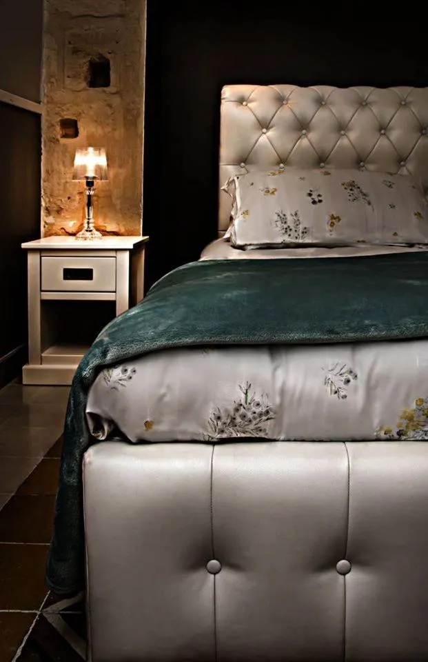 Bed in Luciano Al Porto Boutique