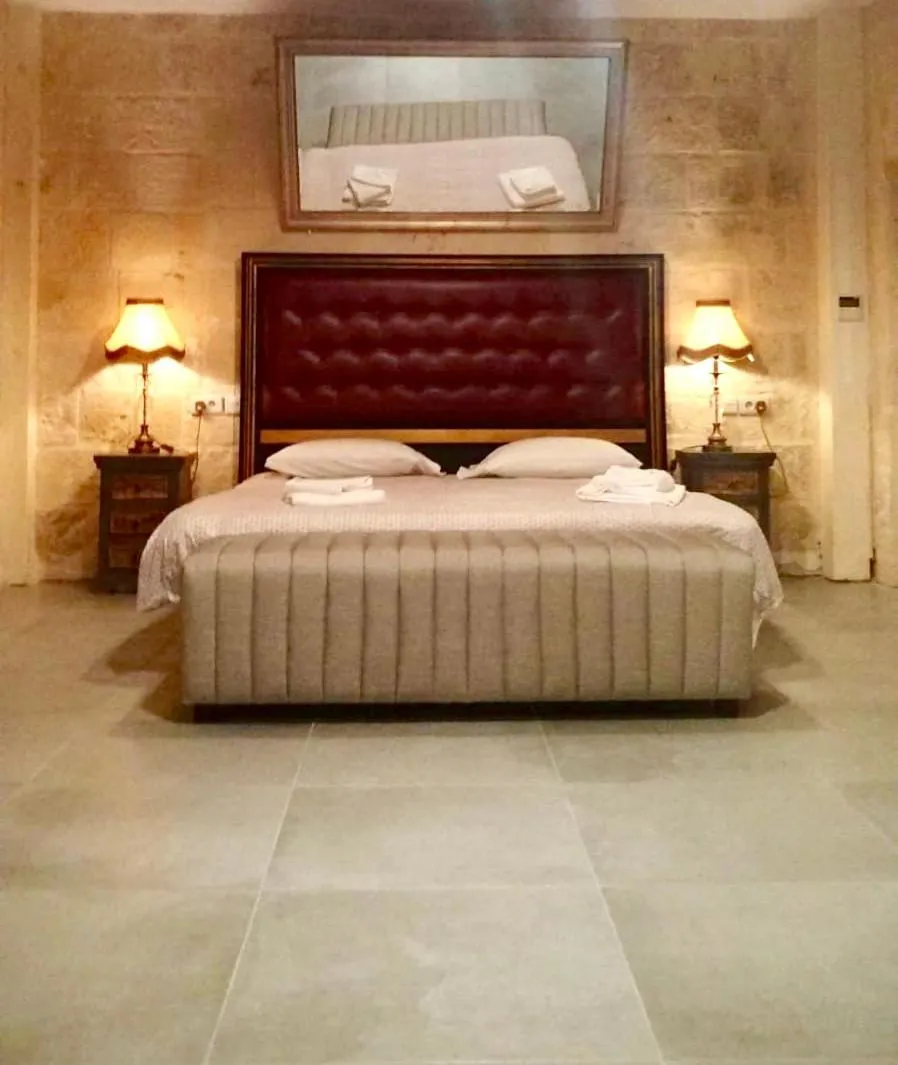 Bed in Luciano Al Porto Boutique