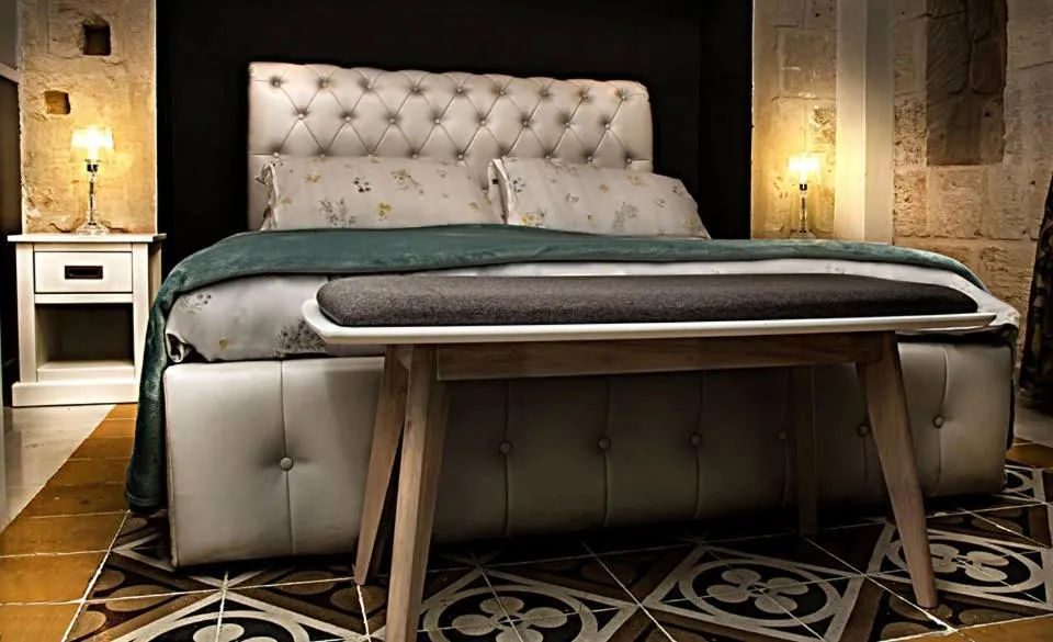 Bed in Luciano Al Porto Boutique