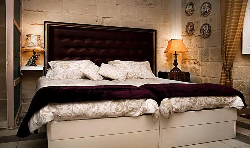 Bed in Luciano Al Porto Boutique