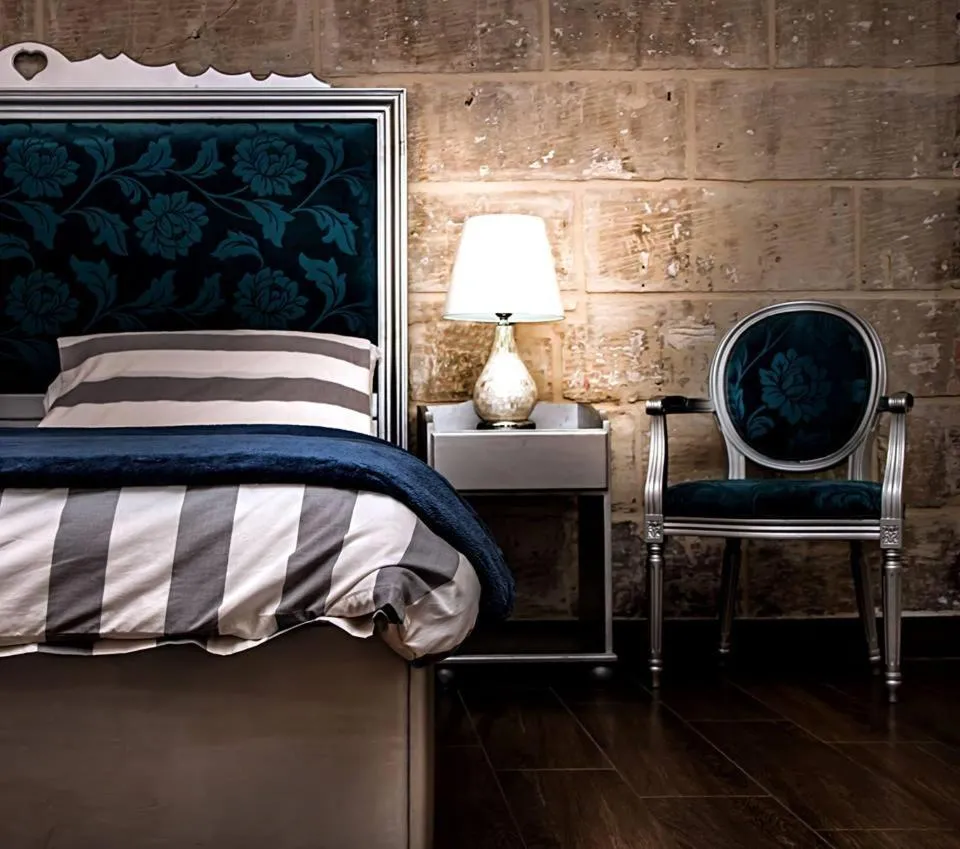 Bed in Luciano Al Porto Boutique