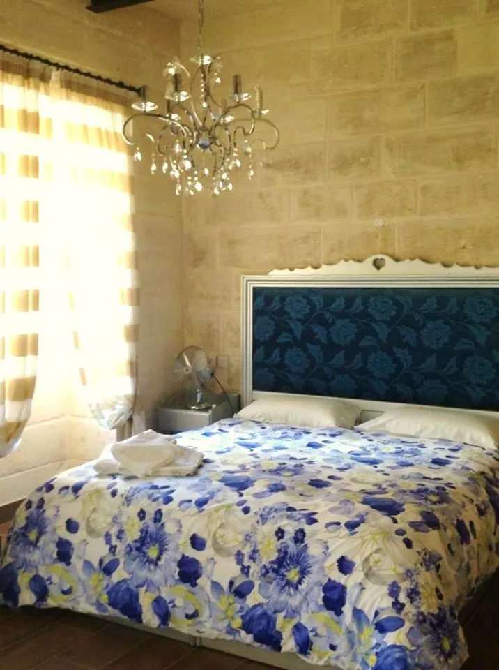 Bed in Luciano Al Porto Boutique