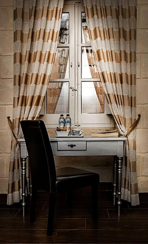 Seating area in Luciano Al Porto Boutique