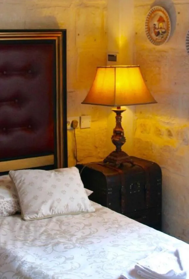Decorative detail, Bed in Luciano Al Porto Boutique
