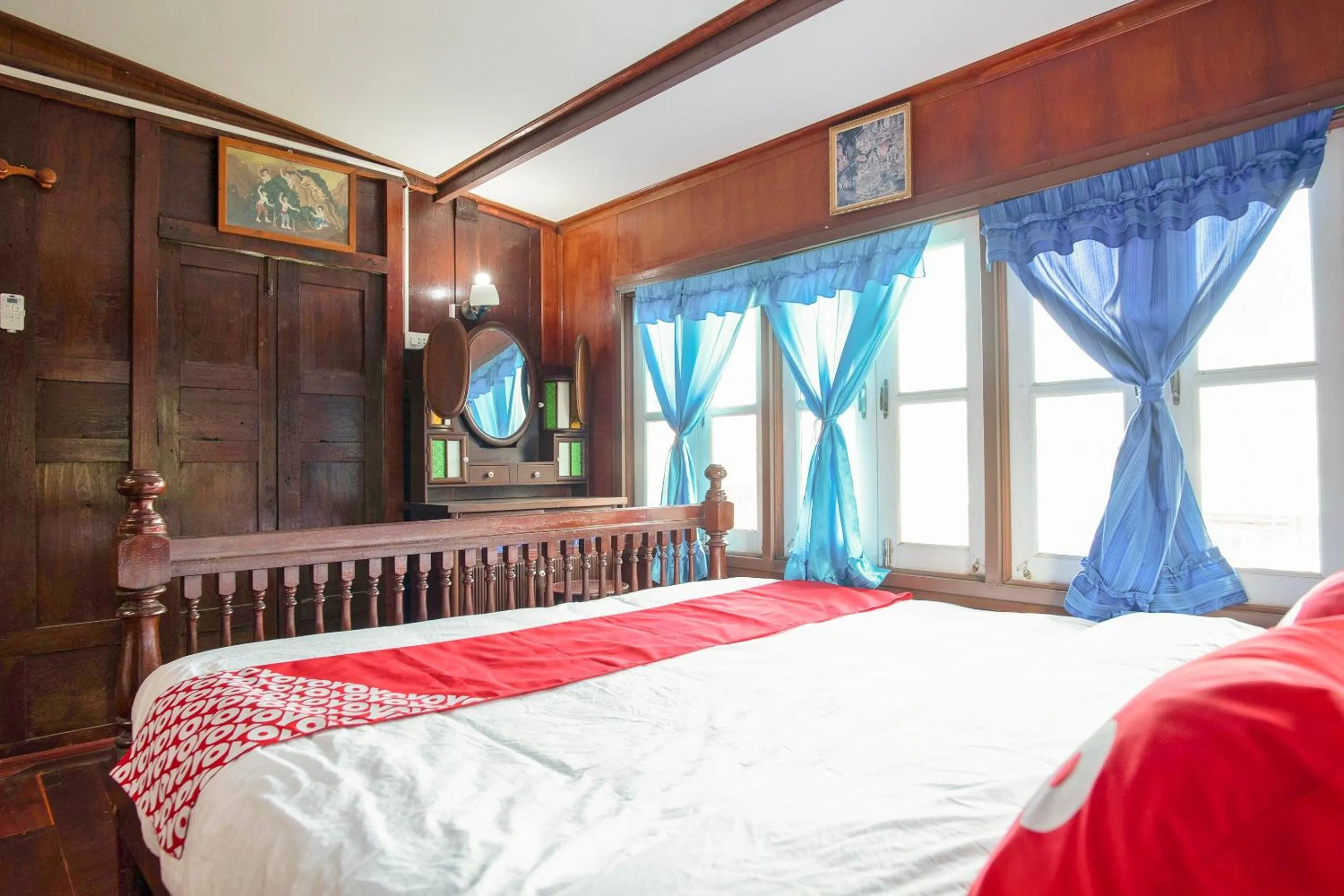 Bedroom in OYO 402 Raknatee Resort