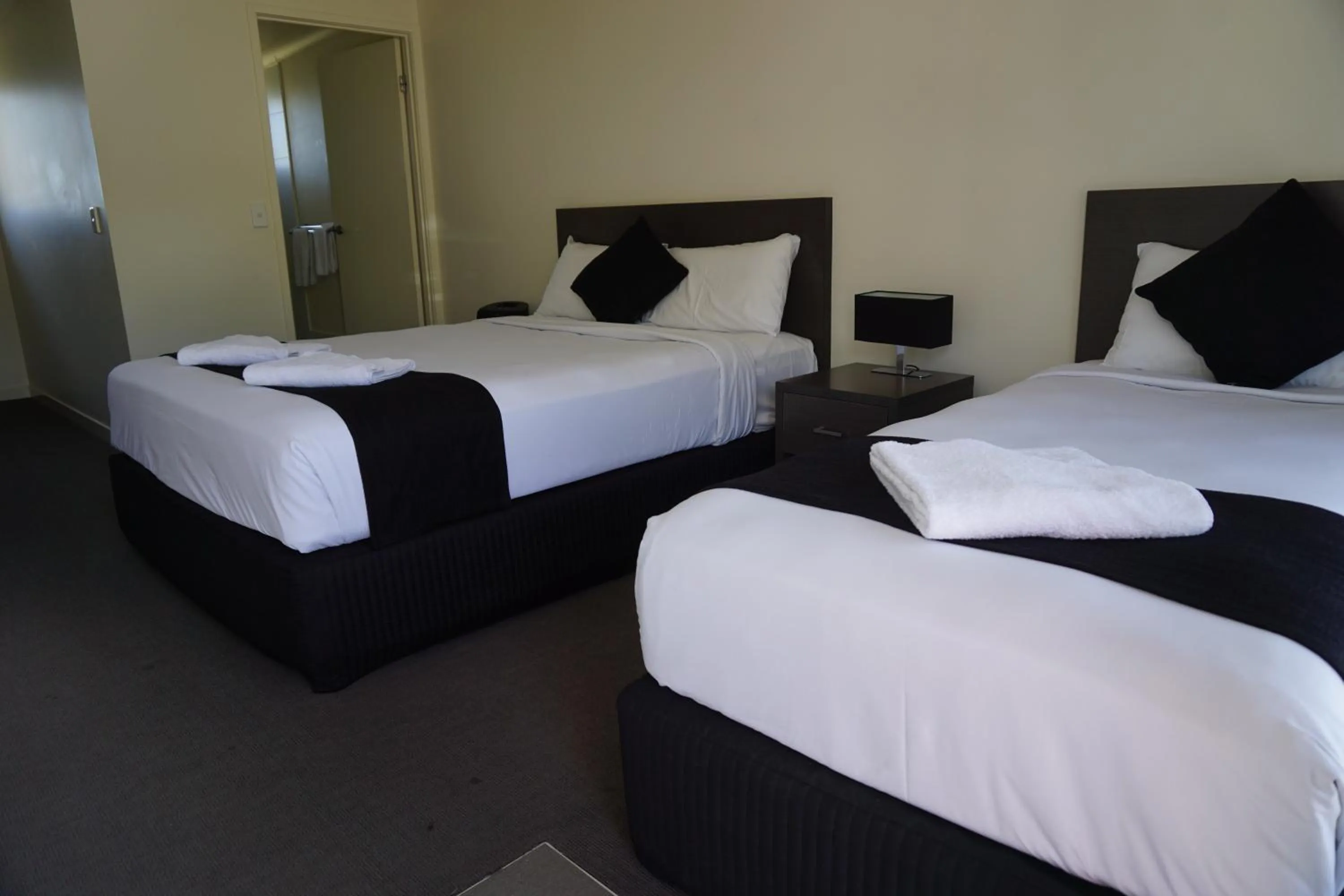 group of guests, Bed in Dooley's Tavern & Motel Springsure