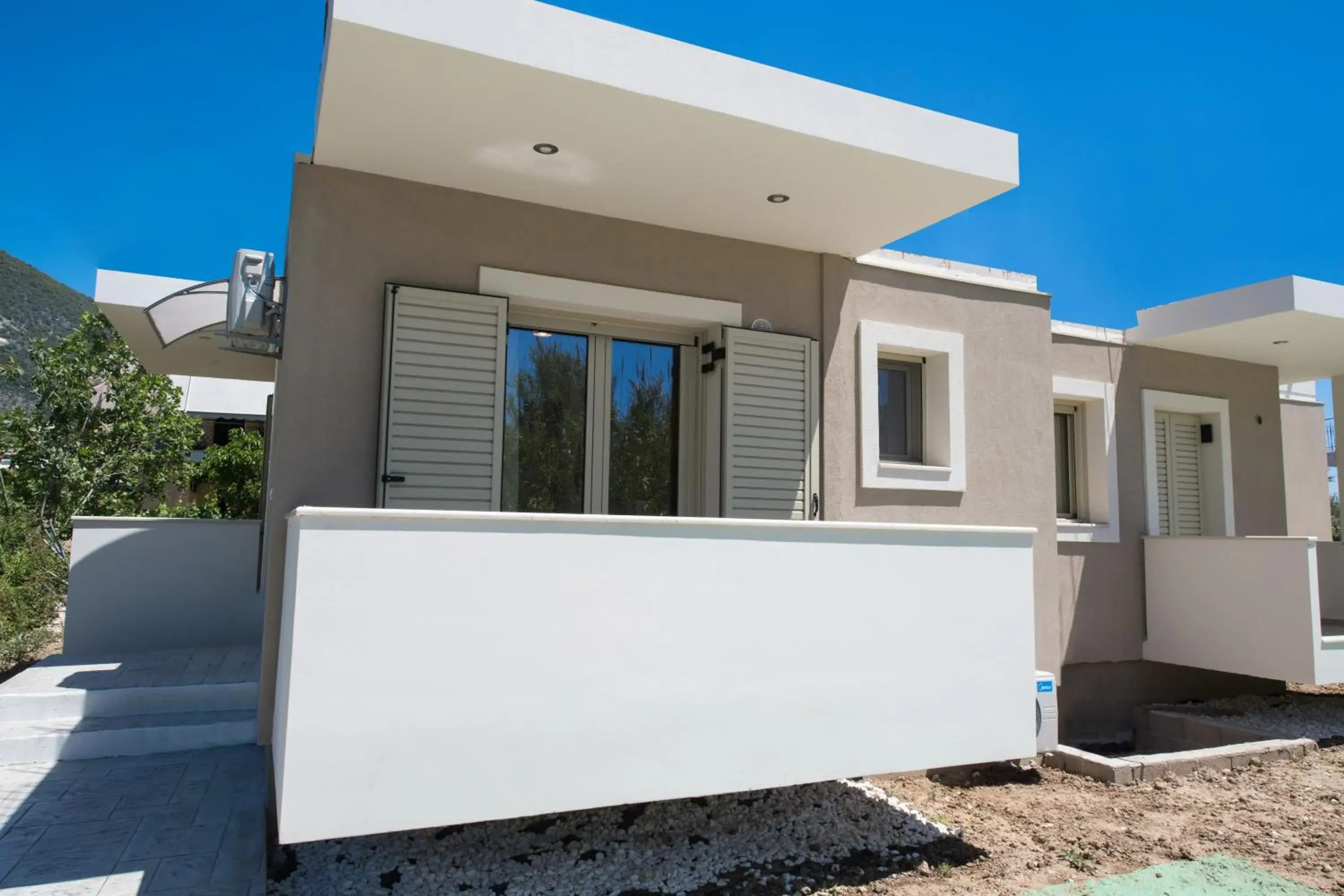 Property building in Bounatsa Studios & Apartments Property building in Bounatsa Studios & Apartments