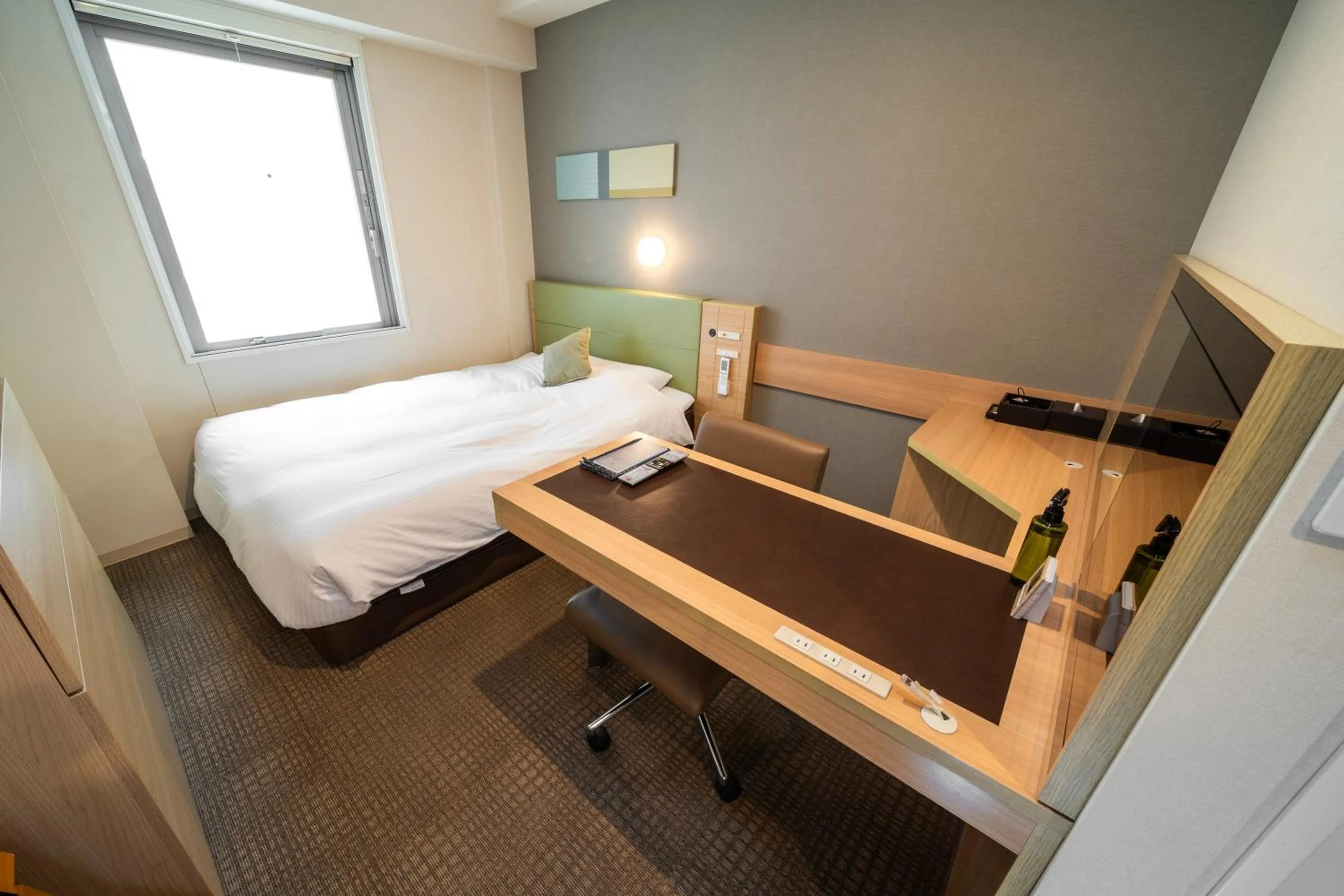 Bed in Super Hotel Premier Tokyo Station Yaesu-Chuoguchi