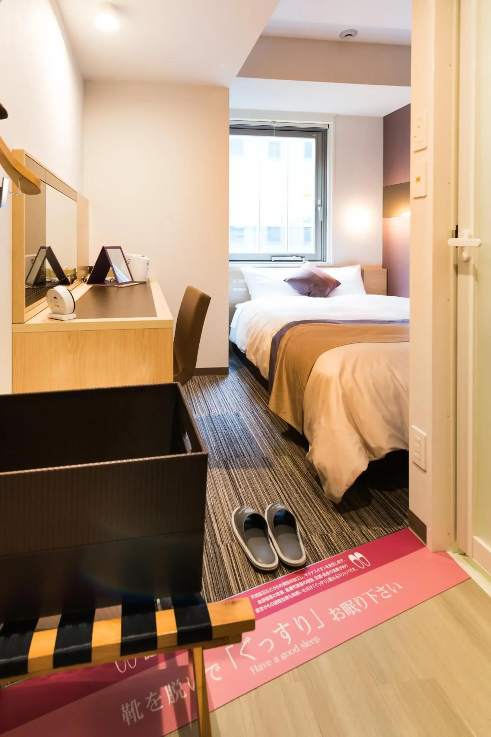 Bed in Super Hotel Premier Tokyo Station Yaesu-Chuoguchi Bed in Super Hotel Premier Tokyo Station Yaesu-Chuoguchi