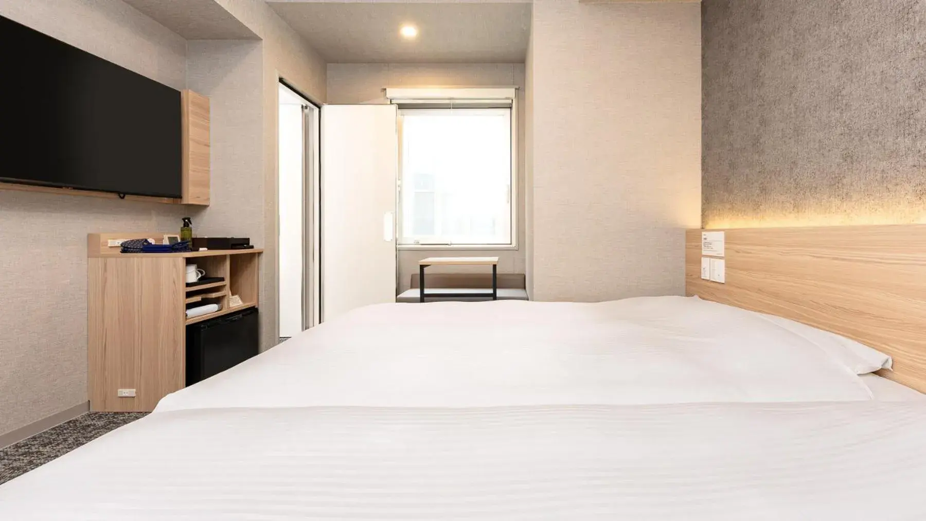 Bed in Super Hotel Premier Tokyo Station Yaesu-Chuoguchi Bed in Super Hotel Premier Tokyo Station Yaesu-Chuoguchi