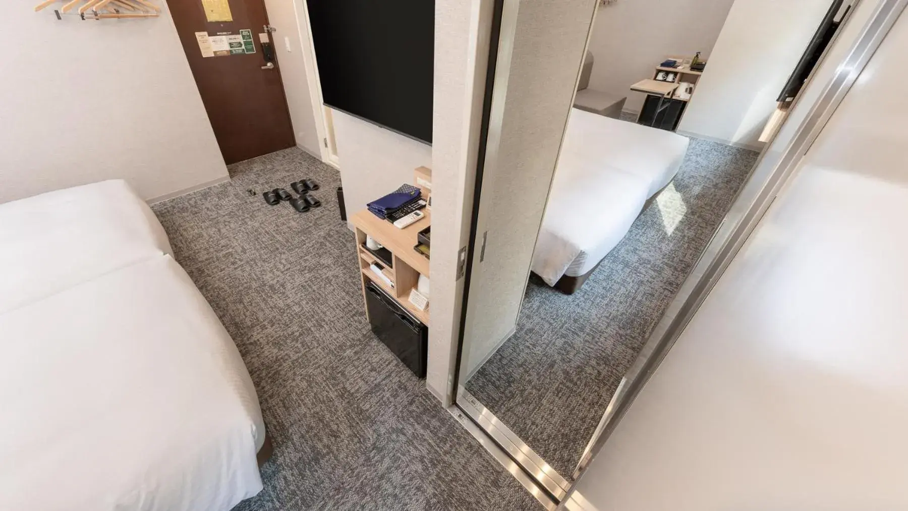 Bed in Super Hotel Premier Tokyo Station Yaesu-Chuoguchi Bed in Super Hotel Premier Tokyo Station Yaesu-Chuoguchi