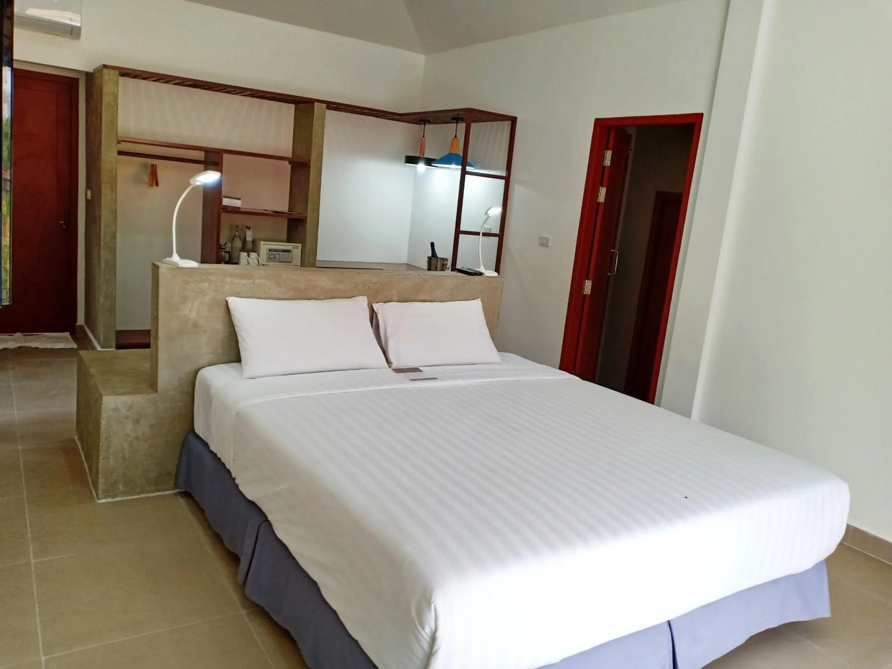 Bed in The Sanctuary Nam Ngum Beach Resort Bed in The Sanctuary Nam Ngum Beach Resort