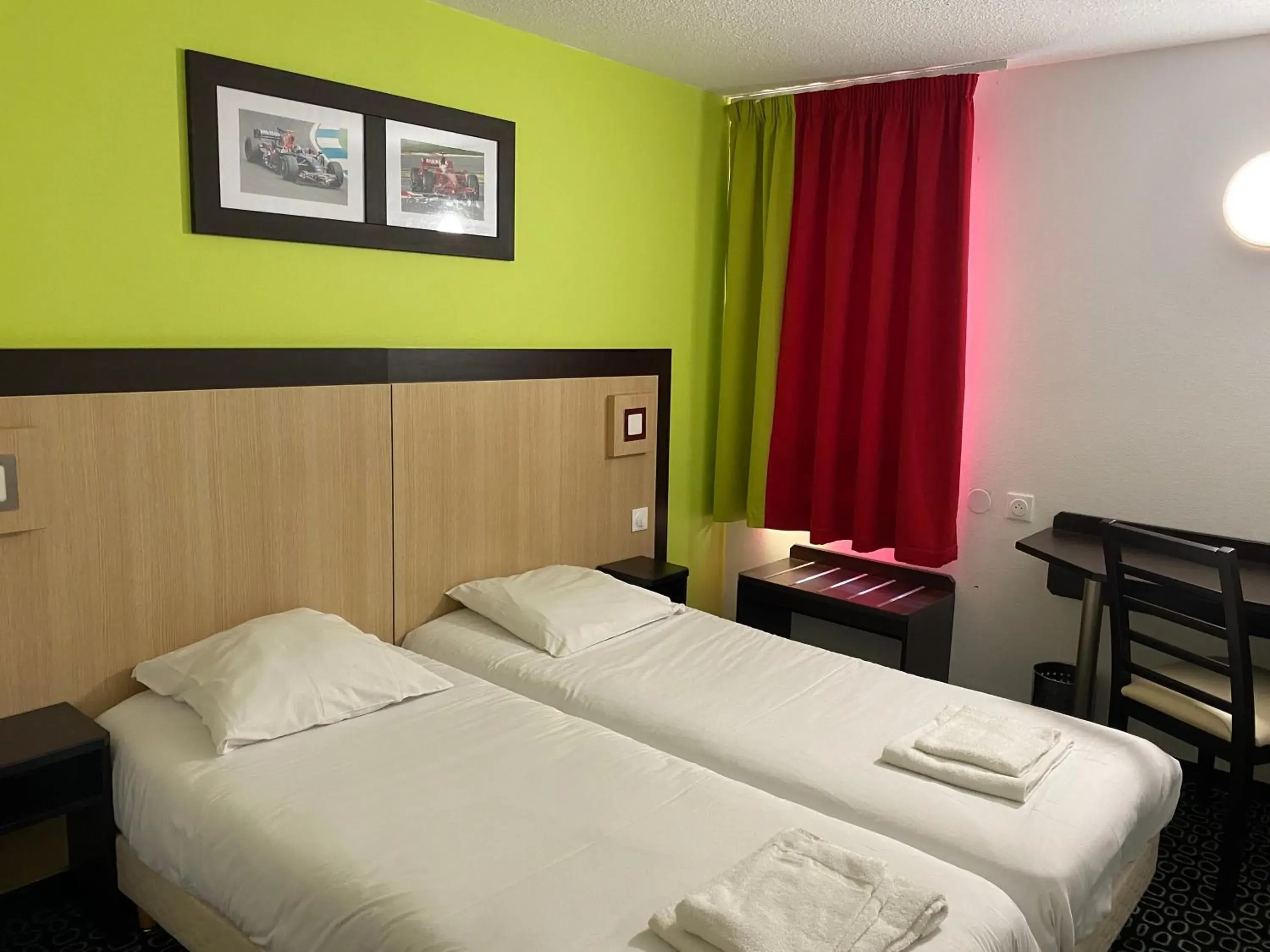 Bed in Enzo Hotels Pont-a-Mousson by Kyriad Direct Bed in Enzo Hotels Pont-a-Mousson by Kyriad Direct