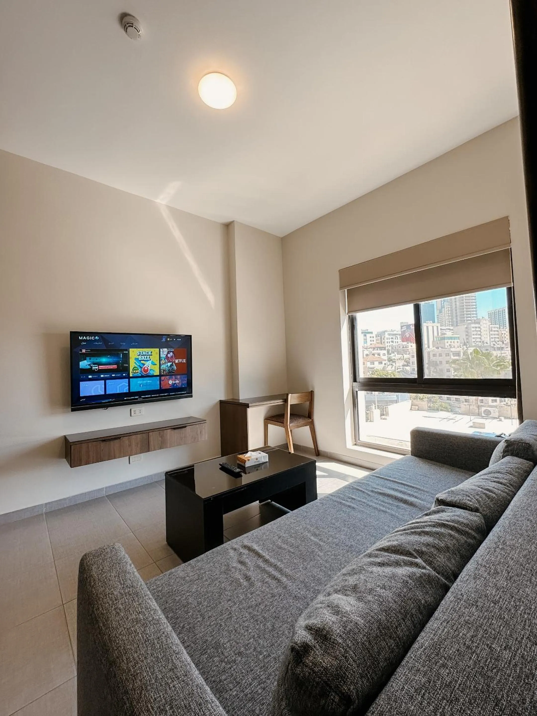 Living room, Bed in Celino Hotel