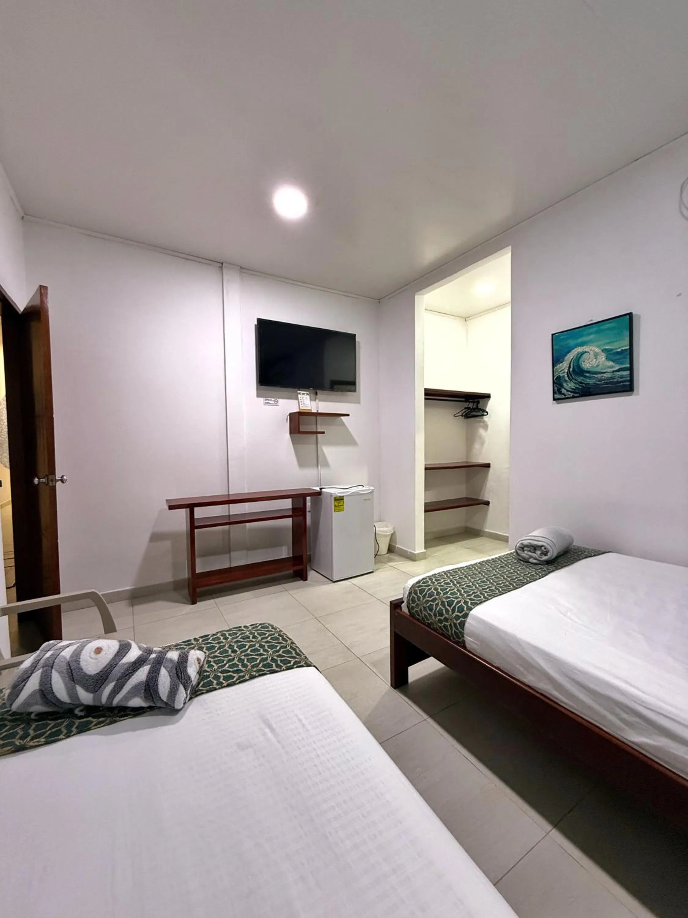 Photo of the whole room, Bed in Apartahotel Caribe Diez