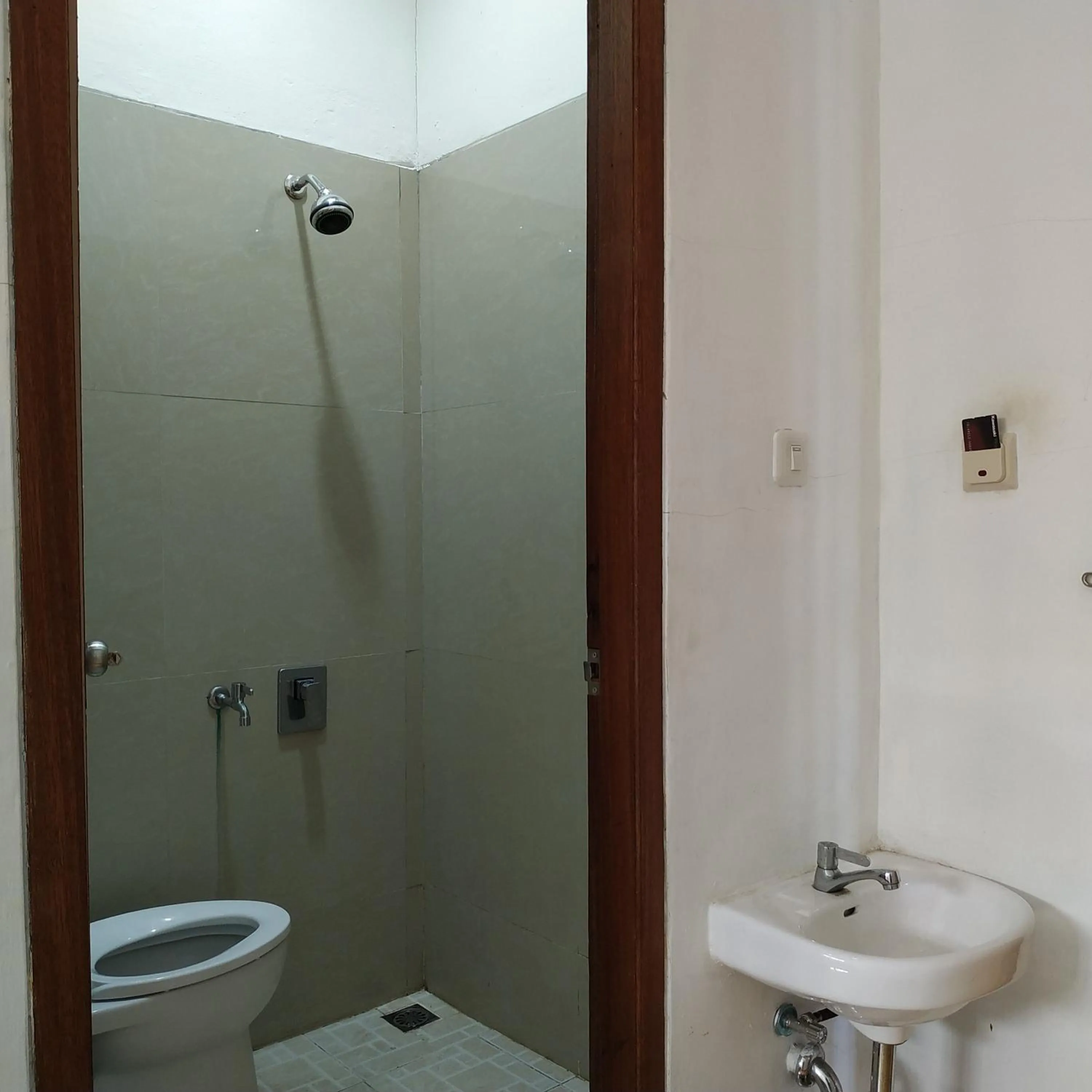 Shower in RedDoorz Syariah near Lahat Station