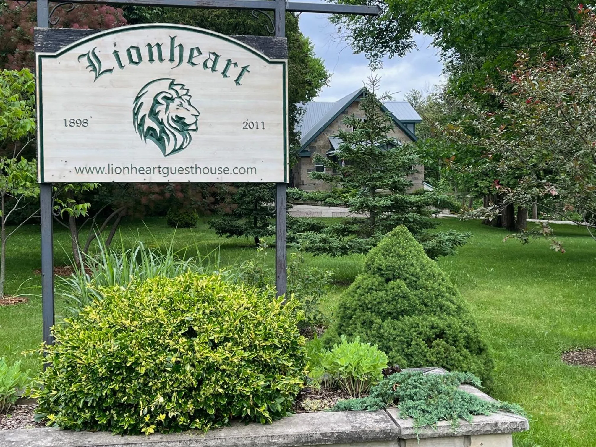 Property logo or sign in Lionheart Guest House