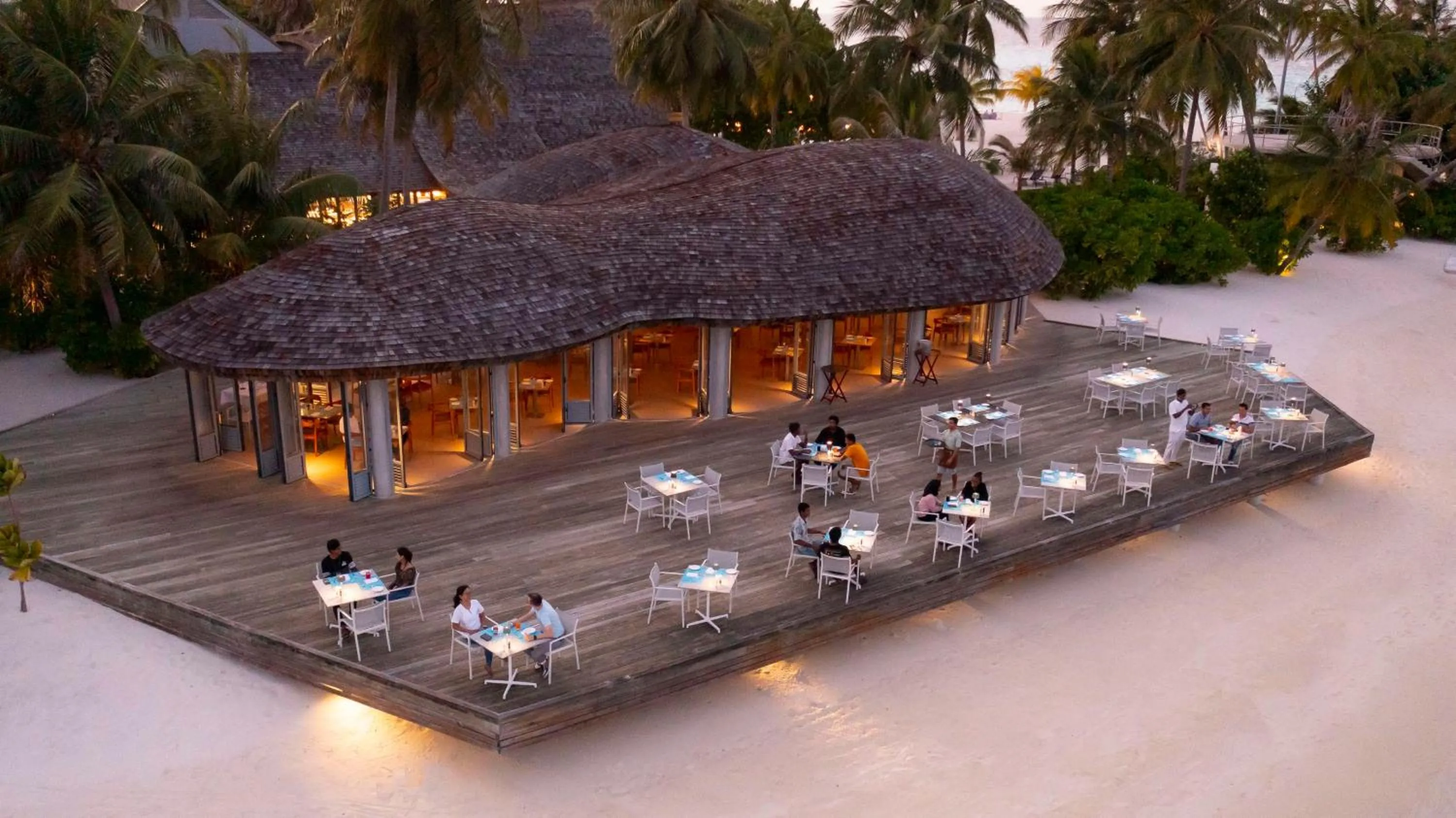 Restaurant/places to eat in OUTRIGGER Maldives Maafushivaru Resort - 25 percent discount on transfers for min 4 nights stay and more, valid for reservations between 01 July till 22 Dec 2025