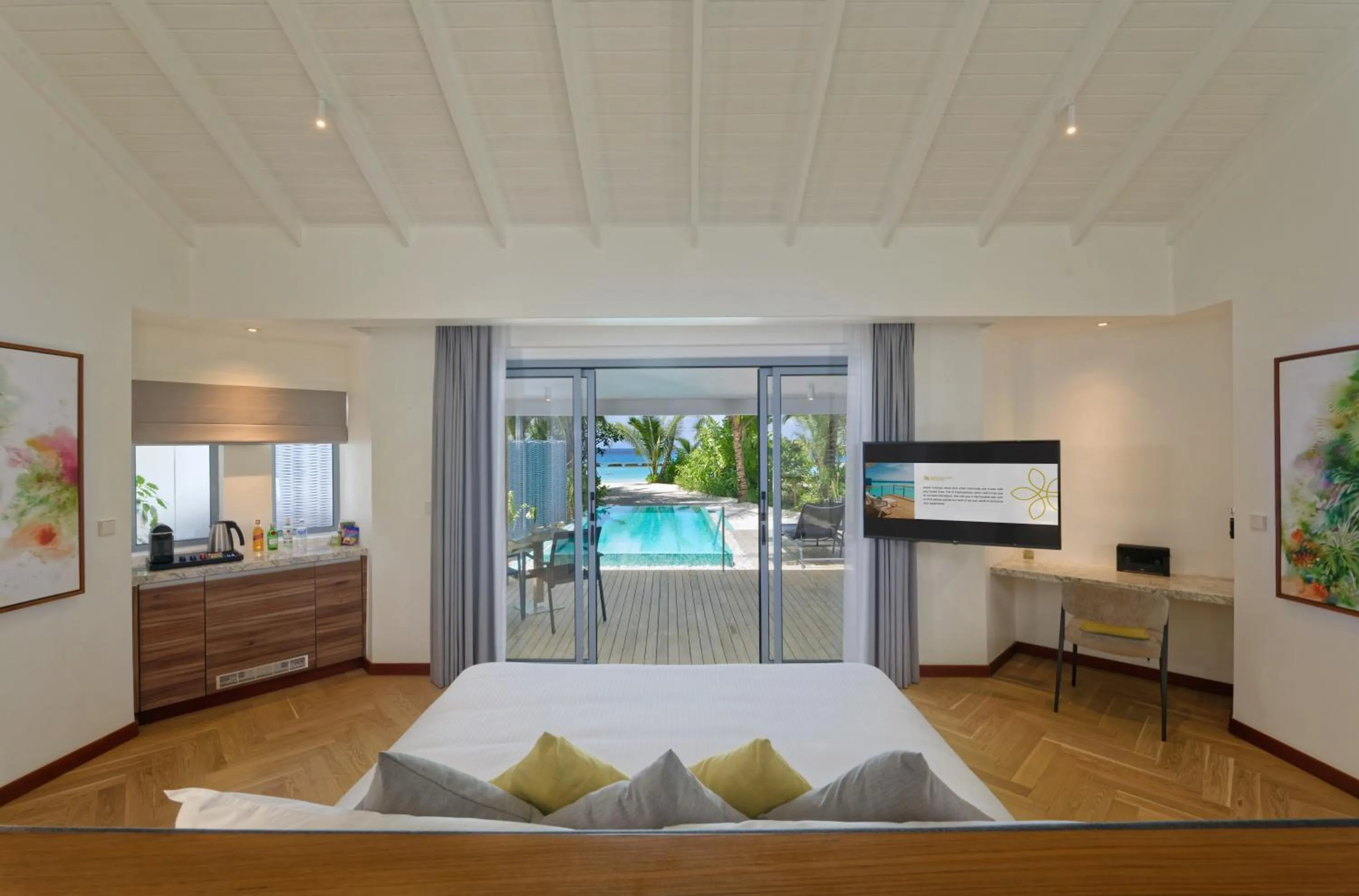 Patio in OUTRIGGER Maldives Maafushivaru Resort - 25 percent discount on transfers for min 4 nights stay and more, valid for reservations between 01 July till 22 Dec 2025