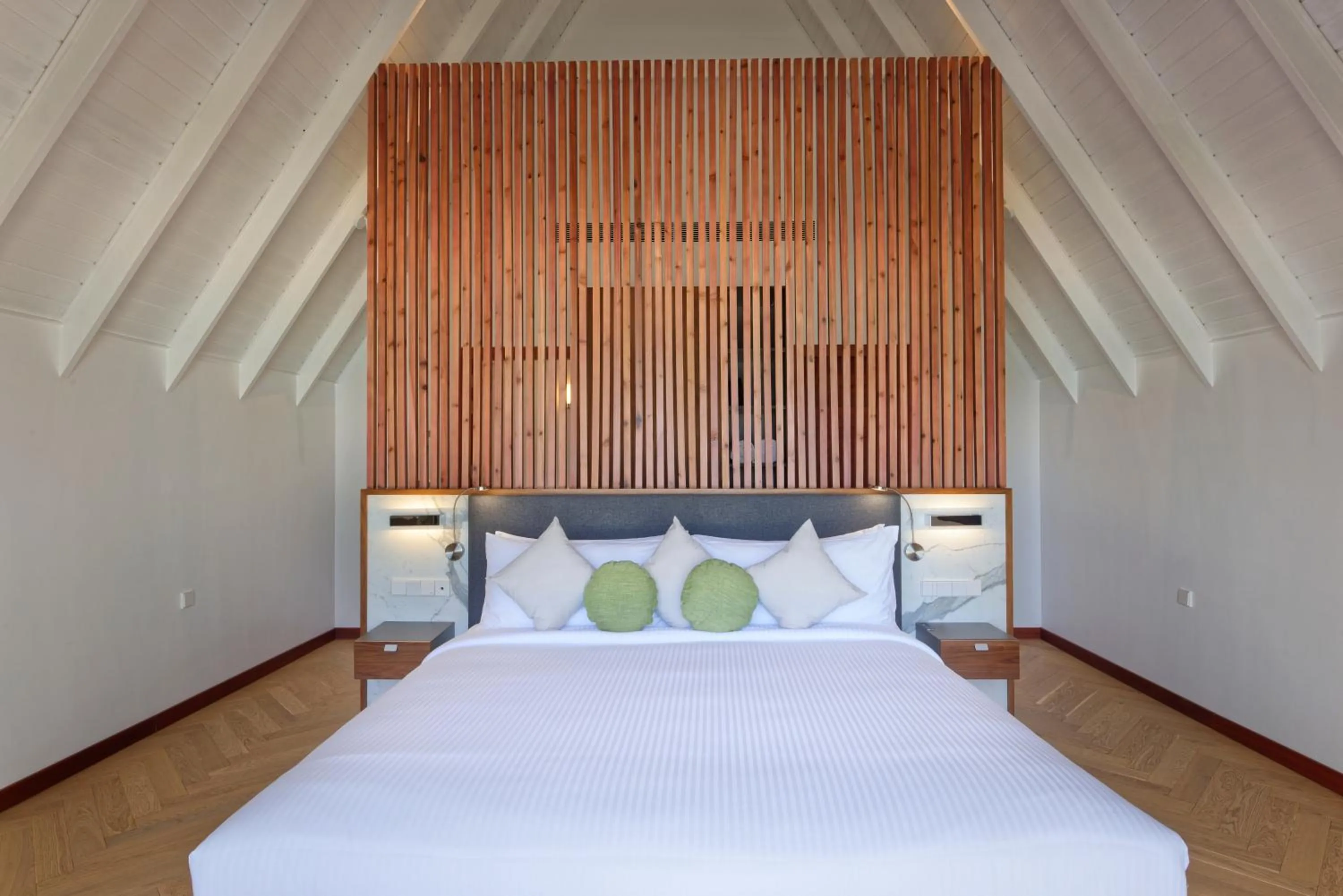 Bedroom, Bed in OUTRIGGER Maldives Maafushivaru Resort - 25 percent discount on transfers for min 4 nights stay and more, valid for reservations between 01 July till 22 Dec 2025