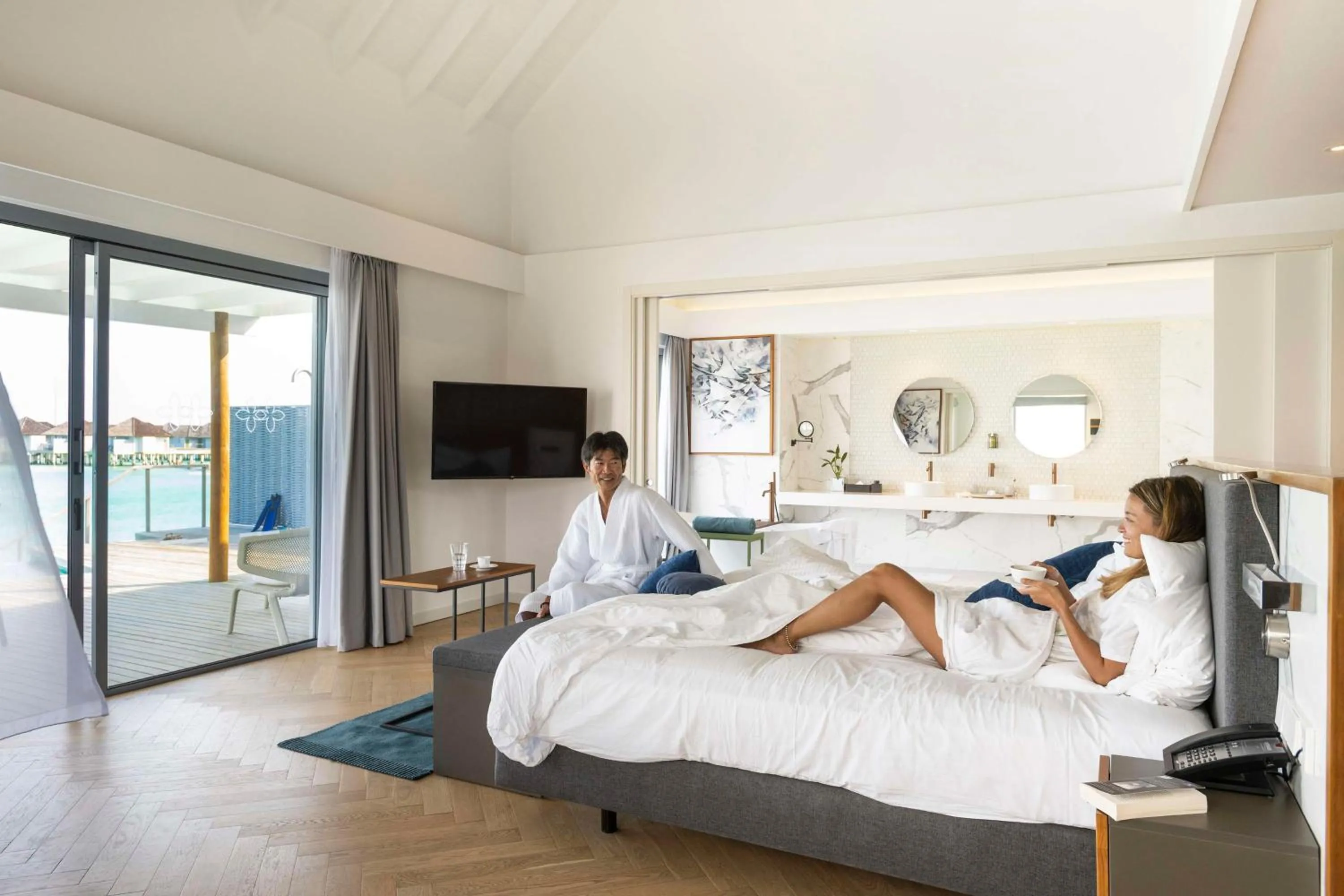 Photo of the whole room, Bed in OUTRIGGER Maldives Maafushivaru Resort - 25 percent discount on transfers for min 4 nights stay and more, valid for reservations between 01 July till 22 Dec 2025