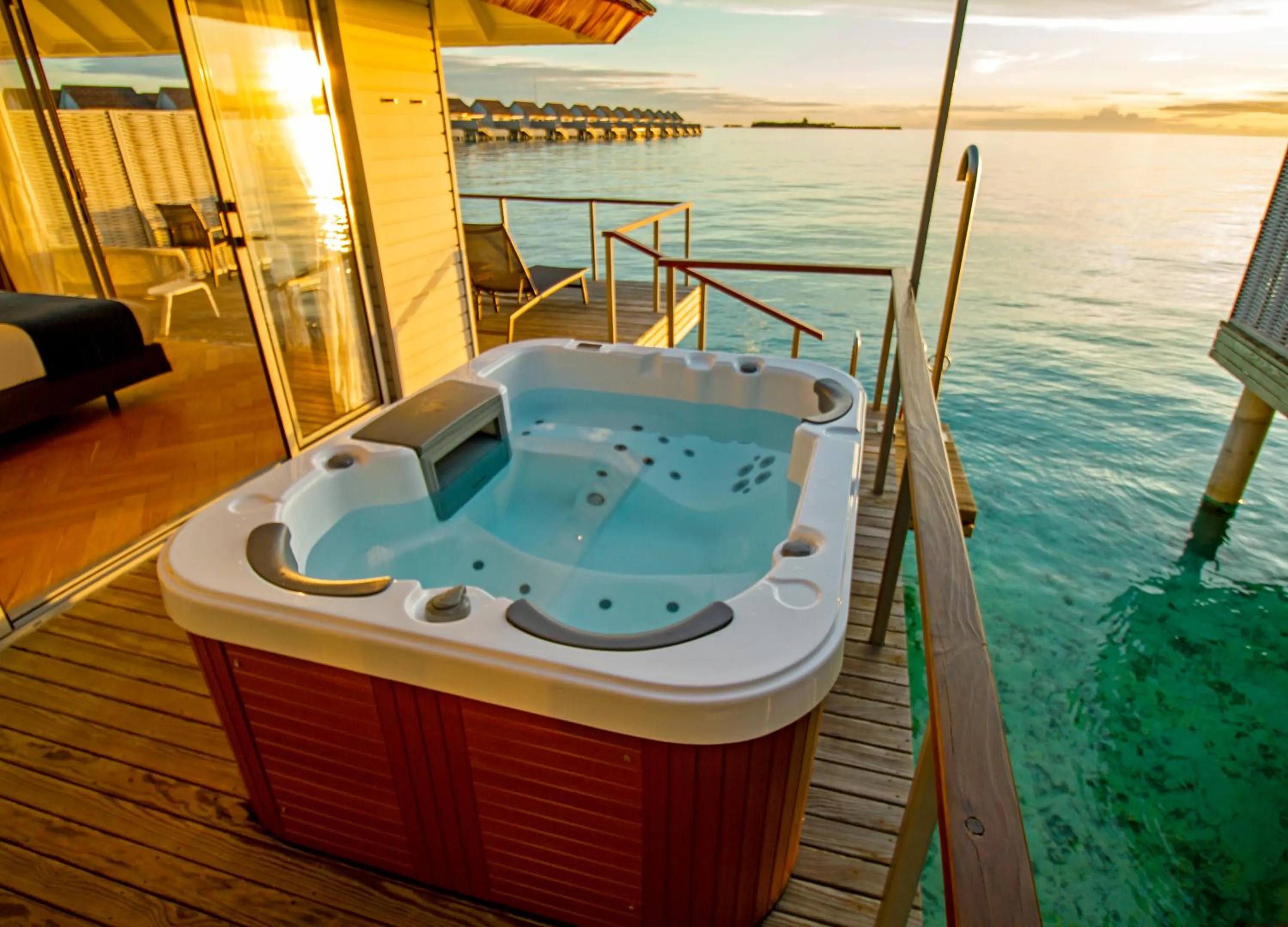 Swimming pool in OUTRIGGER Maldives Maafushivaru Resort - 25 percent discount on transfers for min 4 nights stay and more, valid for reservations between 01 July till 22 Dec 2025