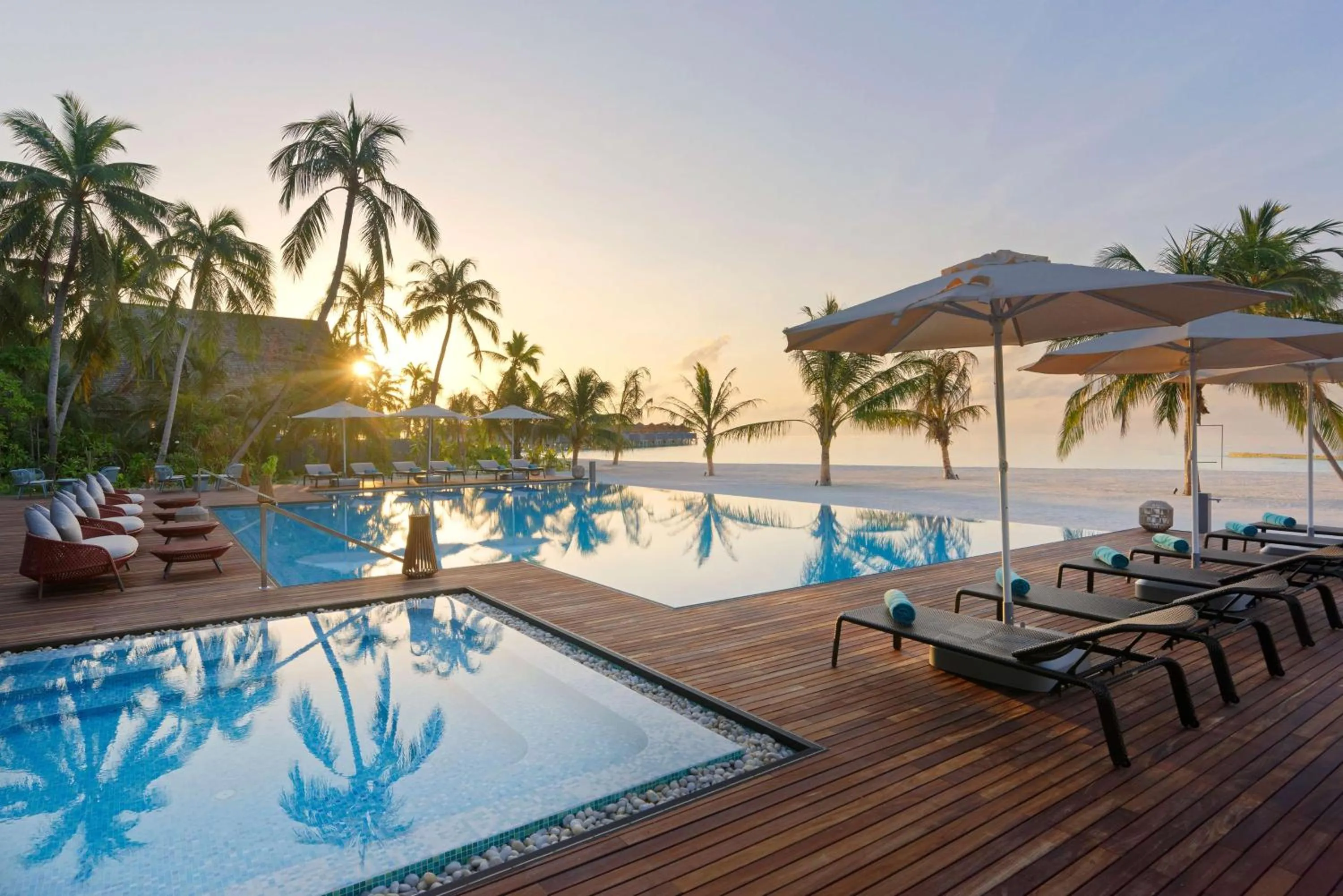 Pool view in OUTRIGGER Maldives Maafushivaru Resort - 25 percent discount on transfers for min 4 nights stay and more, valid for reservations between 01 July till 22 Dec 2025