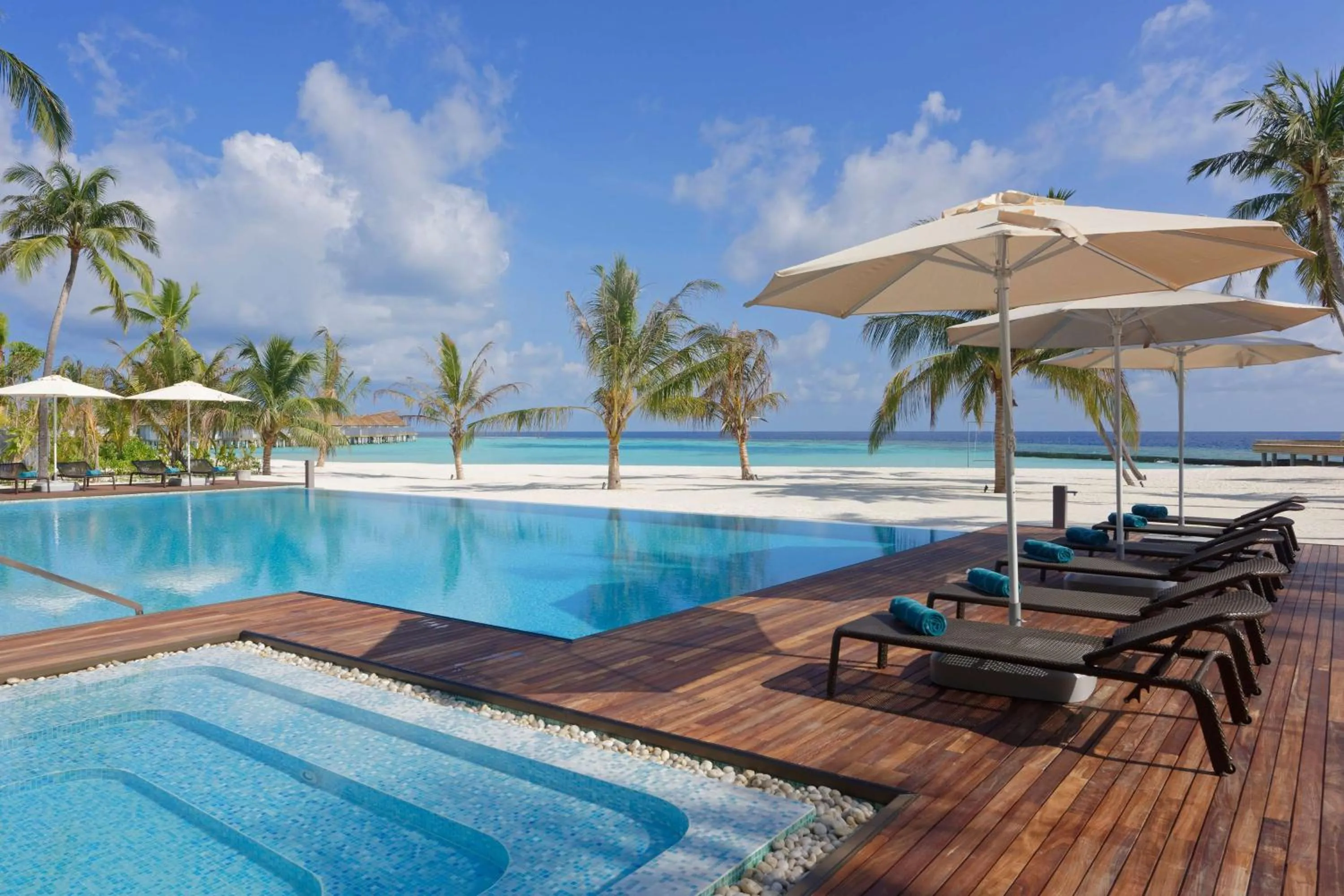 Pool view in OUTRIGGER Maldives Maafushivaru Resort - 25 percent discount on transfers for min 4 nights stay and more, valid for reservations between 01 July till 22 Dec 2025