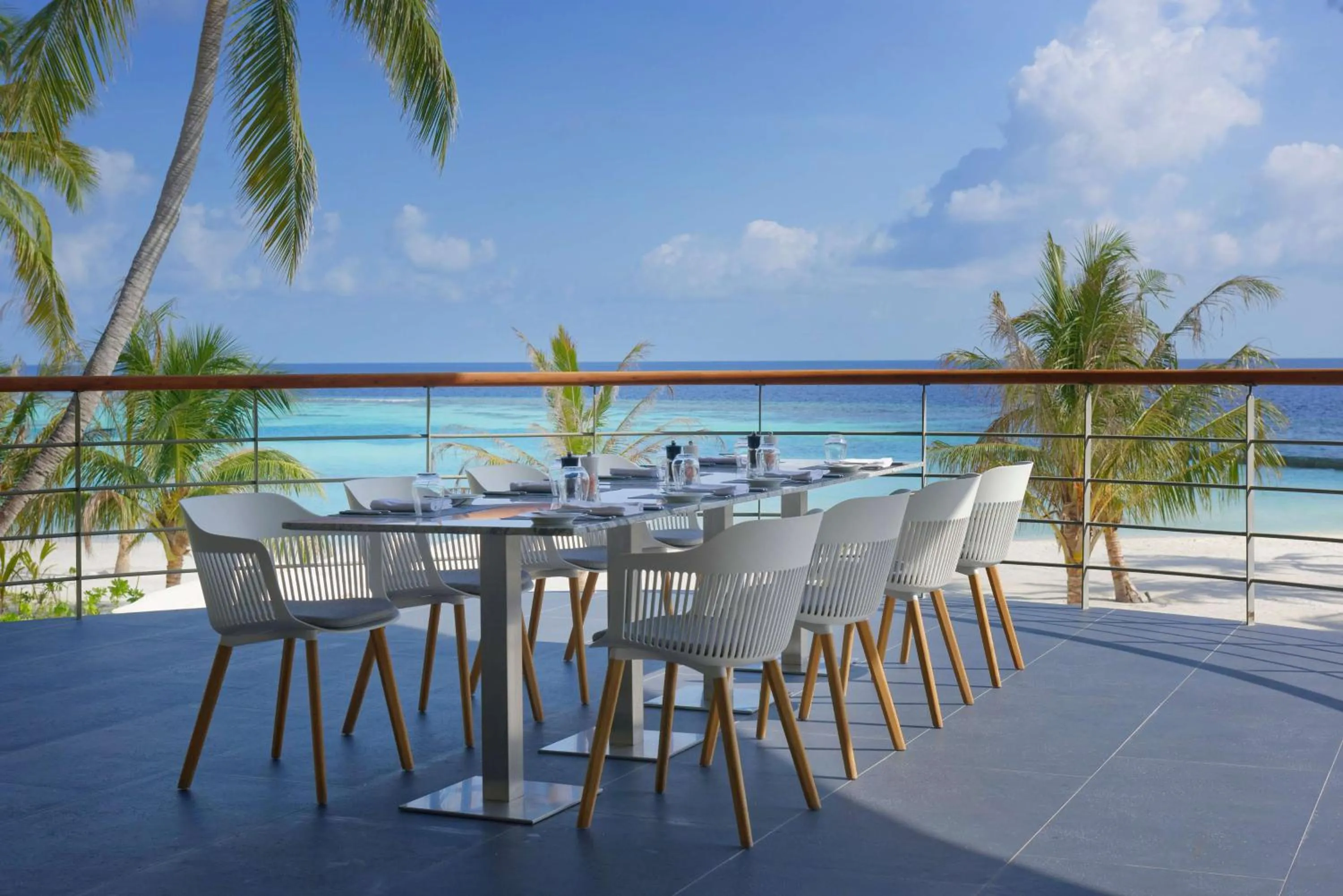 Restaurant/places to eat in OUTRIGGER Maldives Maafushivaru Resort - 25 percent discount on transfers for min 4 nights stay and more, valid for reservations between 01 July till 22 Dec 2025