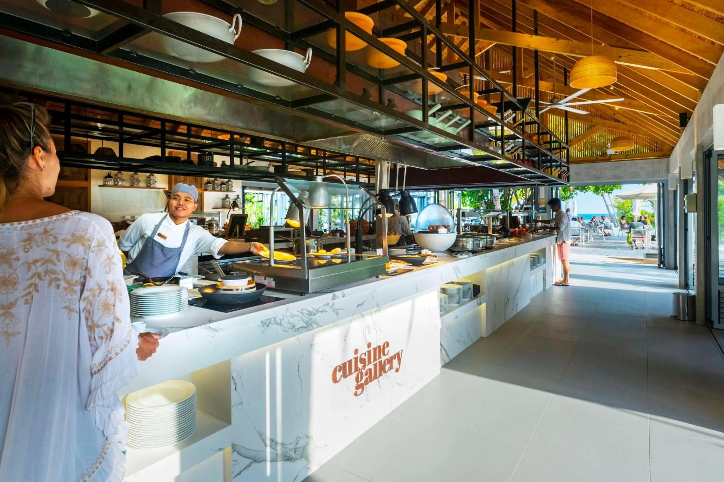 Restaurant/places to eat in OUTRIGGER Maldives Maafushivaru Resort - 25 percent discount on transfers for min 4 nights stay and more, valid for reservations between 01 July till 22 Dec 2025
