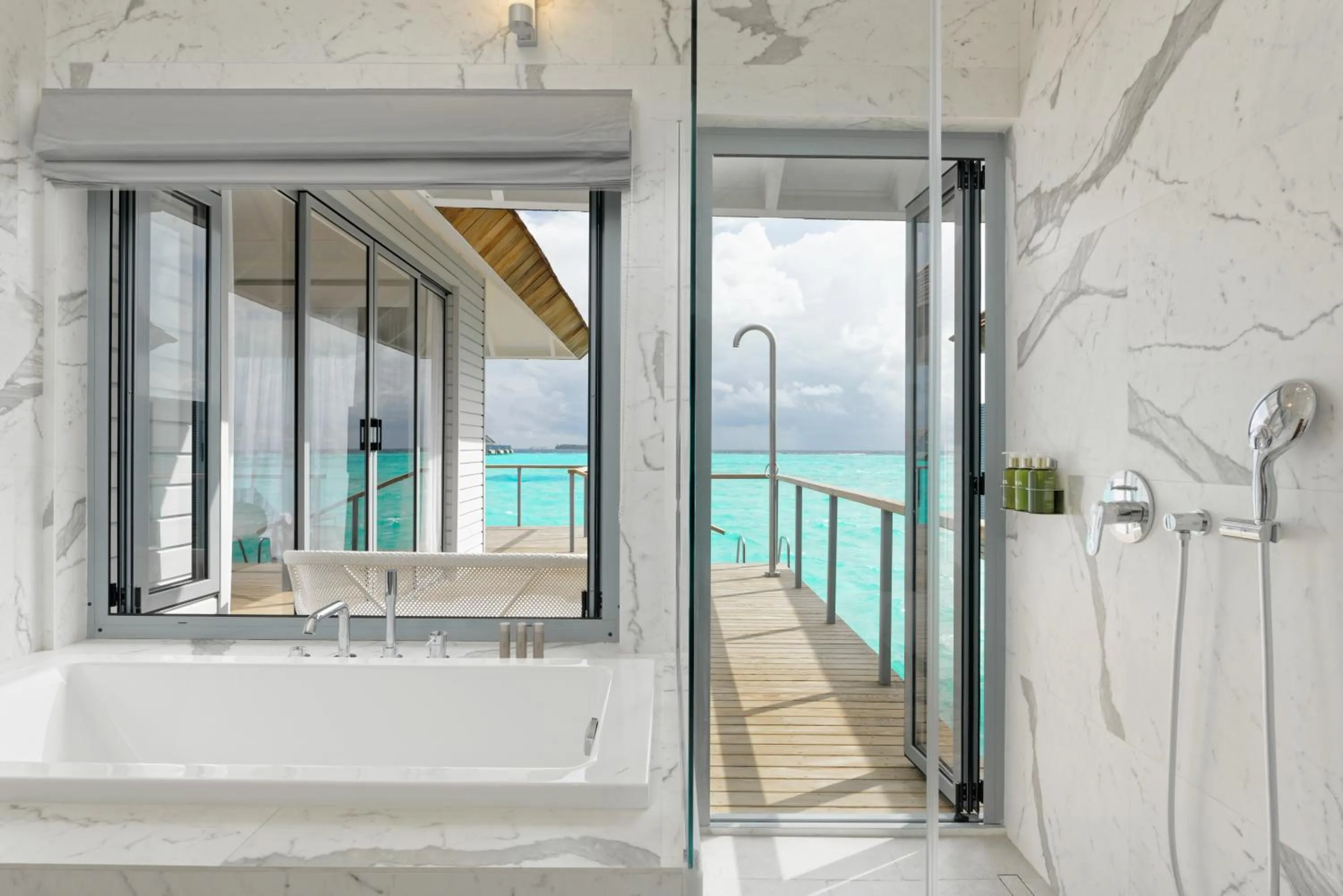 Shower in OUTRIGGER Maldives Maafushivaru Resort - 25 percent discount on transfers for min 4 nights stay and more, valid for reservations between 01 July till 22 Dec 2025