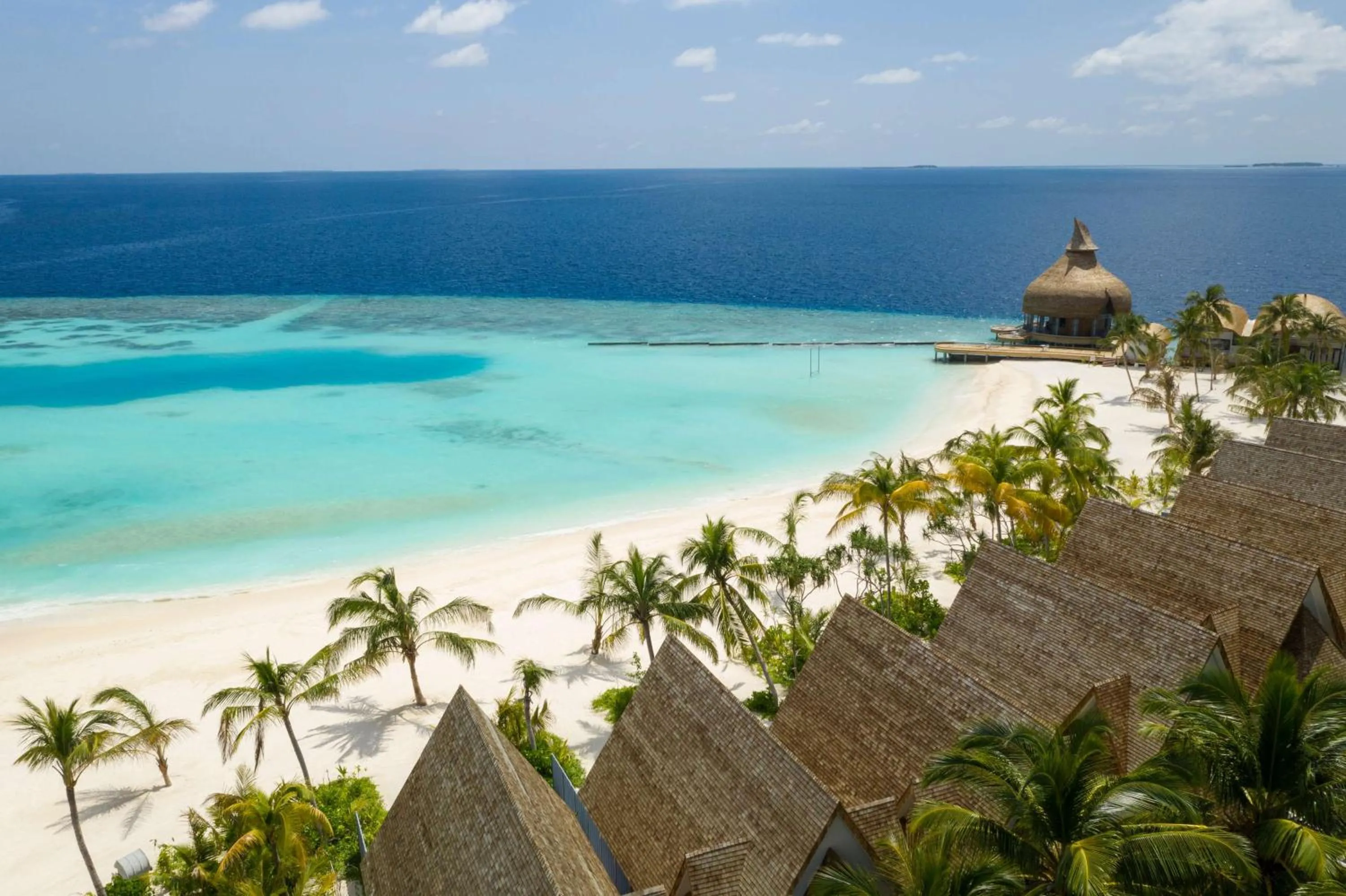 Beach in OUTRIGGER Maldives Maafushivaru Resort - 25 percent discount on transfers for min 4 nights stay and more, valid for reservations between 01 July till 22 Dec 2025