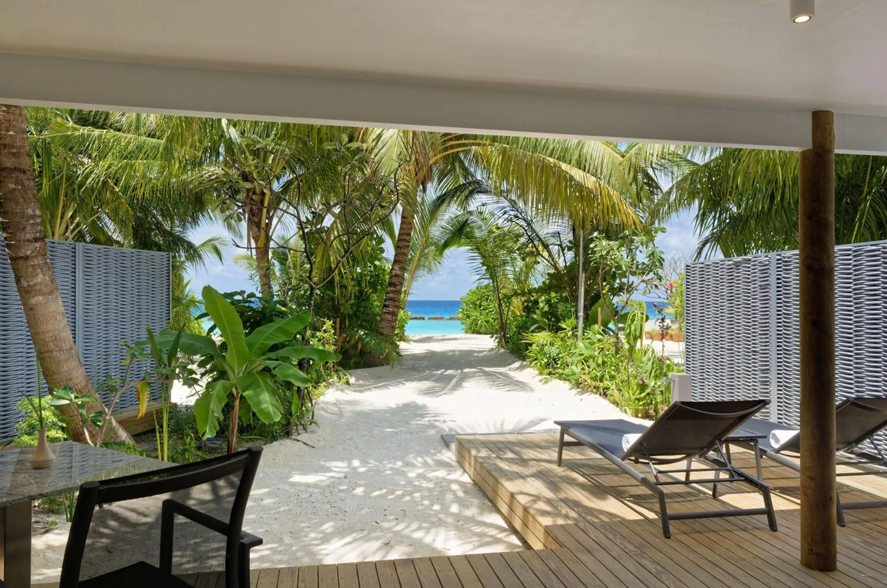 Photo of the whole room in OUTRIGGER Maldives Maafushivaru Resort - 25 percent discount on transfers for min 4 nights stay and more, valid for reservations between 01 July till 22 Dec 2025