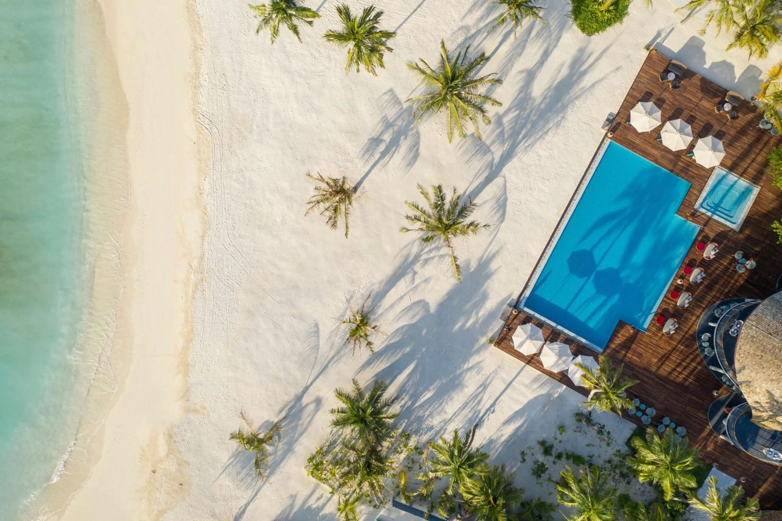 Pool view in OUTRIGGER Maldives Maafushivaru Resort - 25 percent discount on transfers for min 4 nights stay and more, valid for reservations between 01 July till 22 Dec 2025