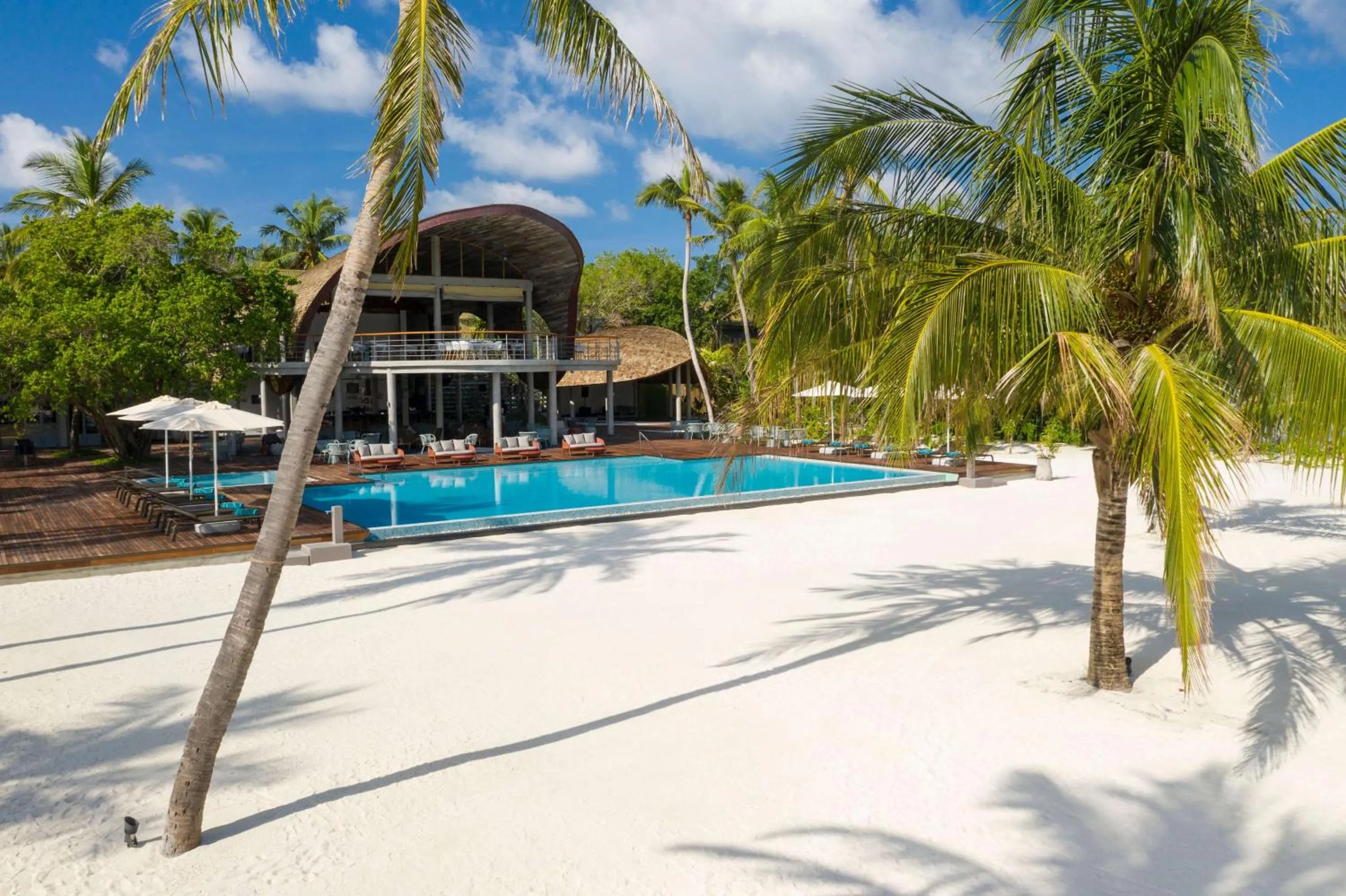 Beach in OUTRIGGER Maldives Maafushivaru Resort - 25 percent discount on transfers for min 4 nights stay and more, valid for reservations between 01 July till 22 Dec 2025