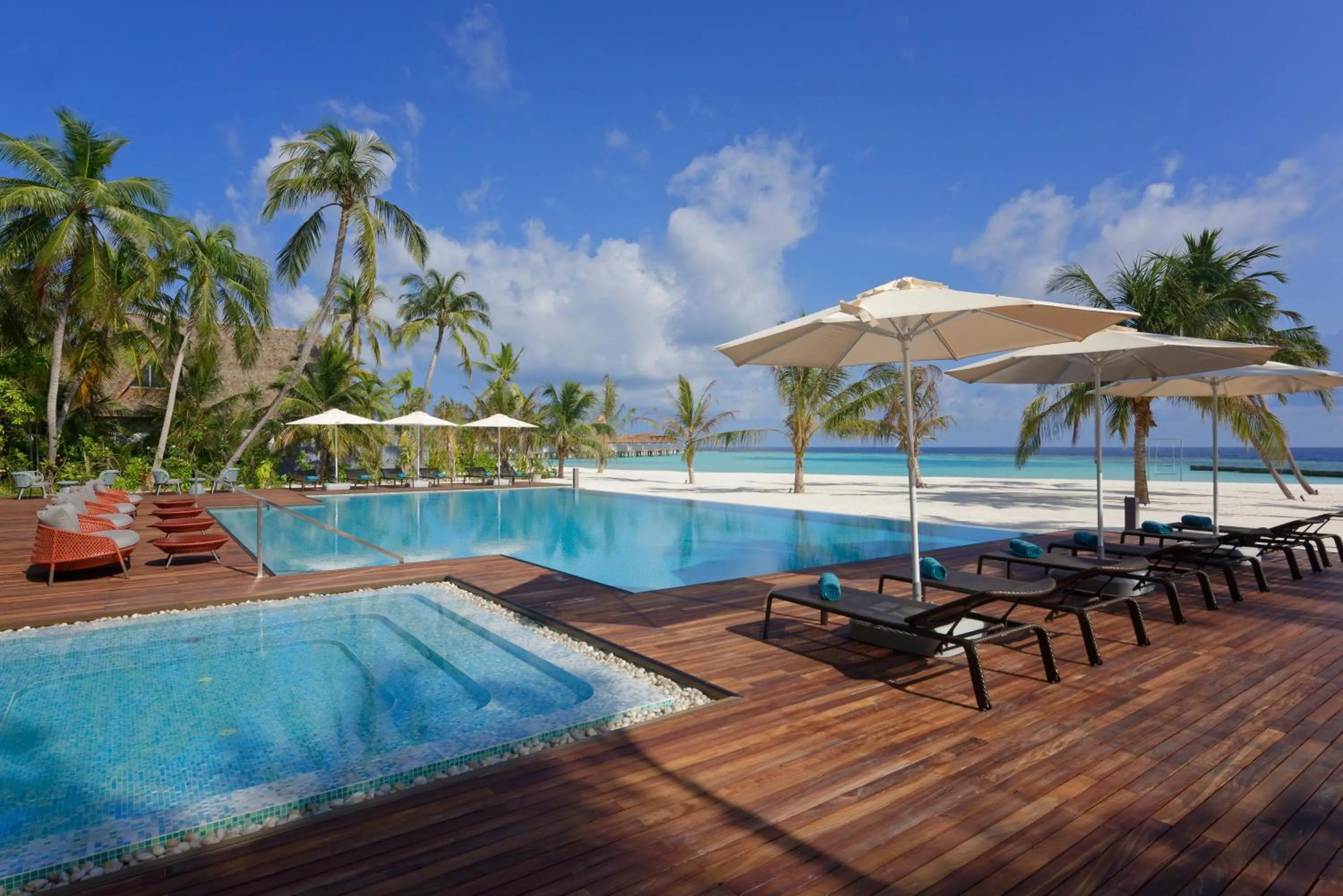 Swimming pool in OUTRIGGER Maldives Maafushivaru Resort - 25 percent discount on transfers for min 4 nights stay and more, valid for reservations between 01 July till 22 Dec 2025