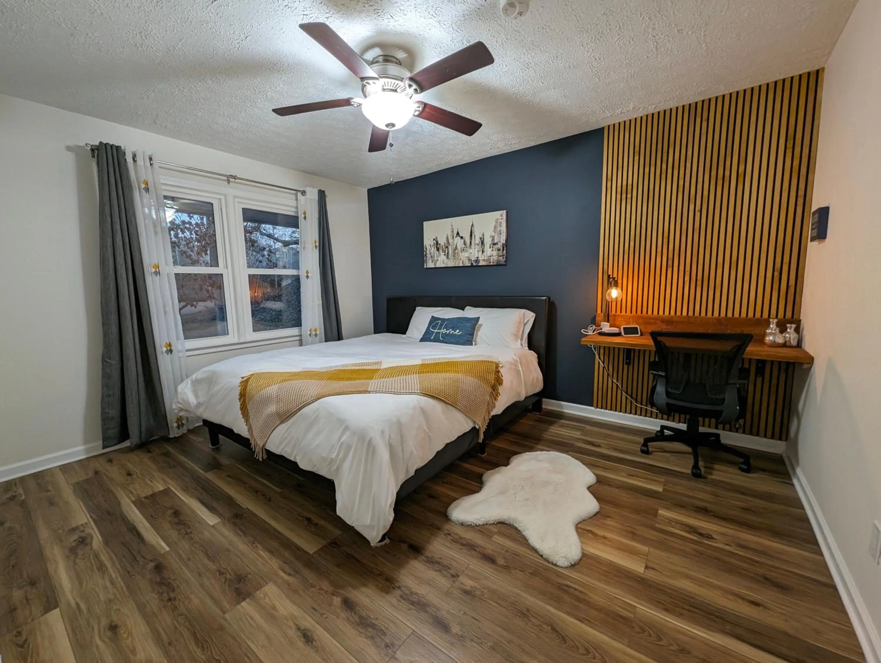 Bed in Modern Luxe Family & Groups Friendly Bungalow with Patio & Workspace