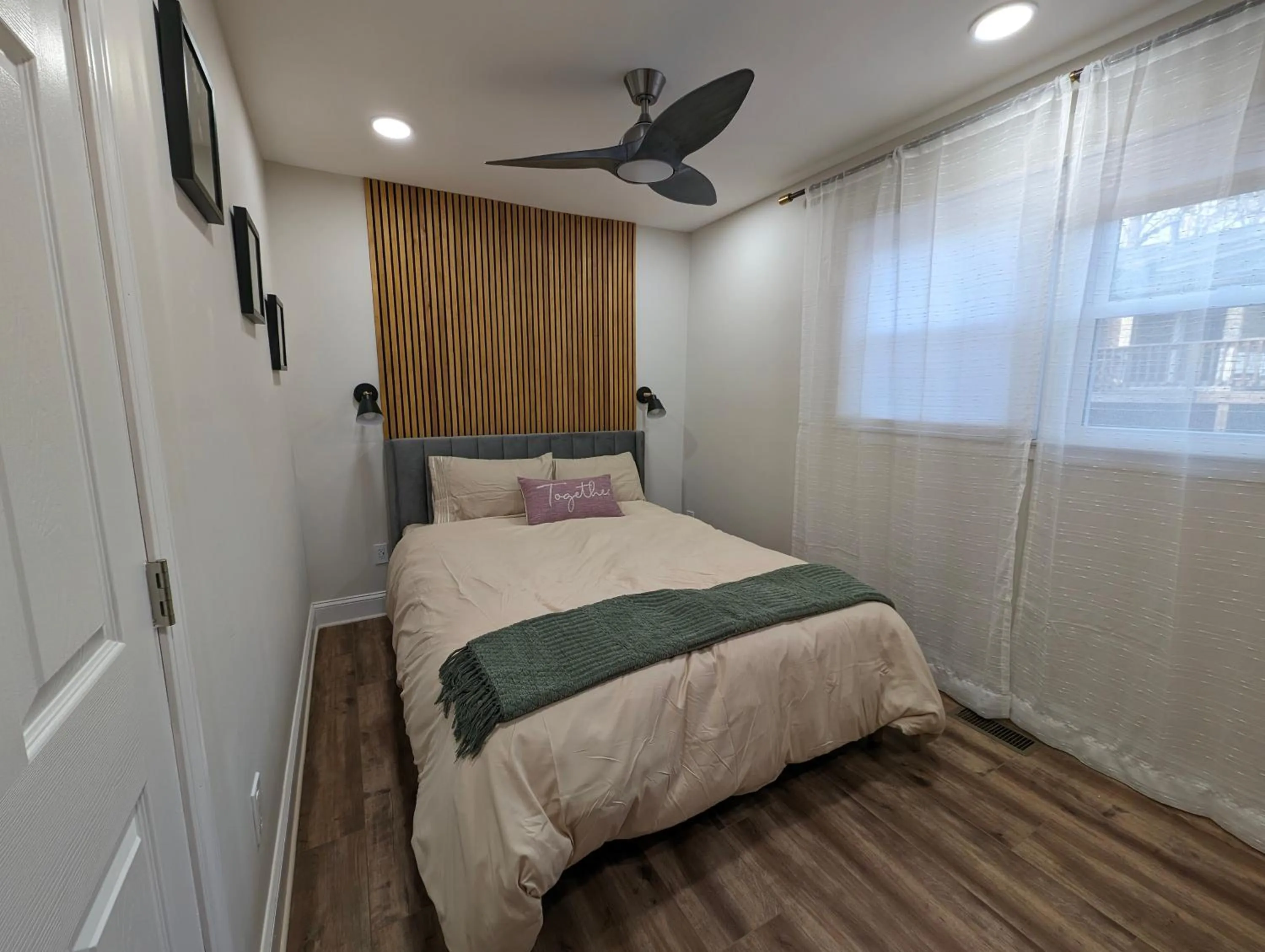 Bed in Modern Luxe Family & Groups Friendly Bungalow with Patio & Workspace