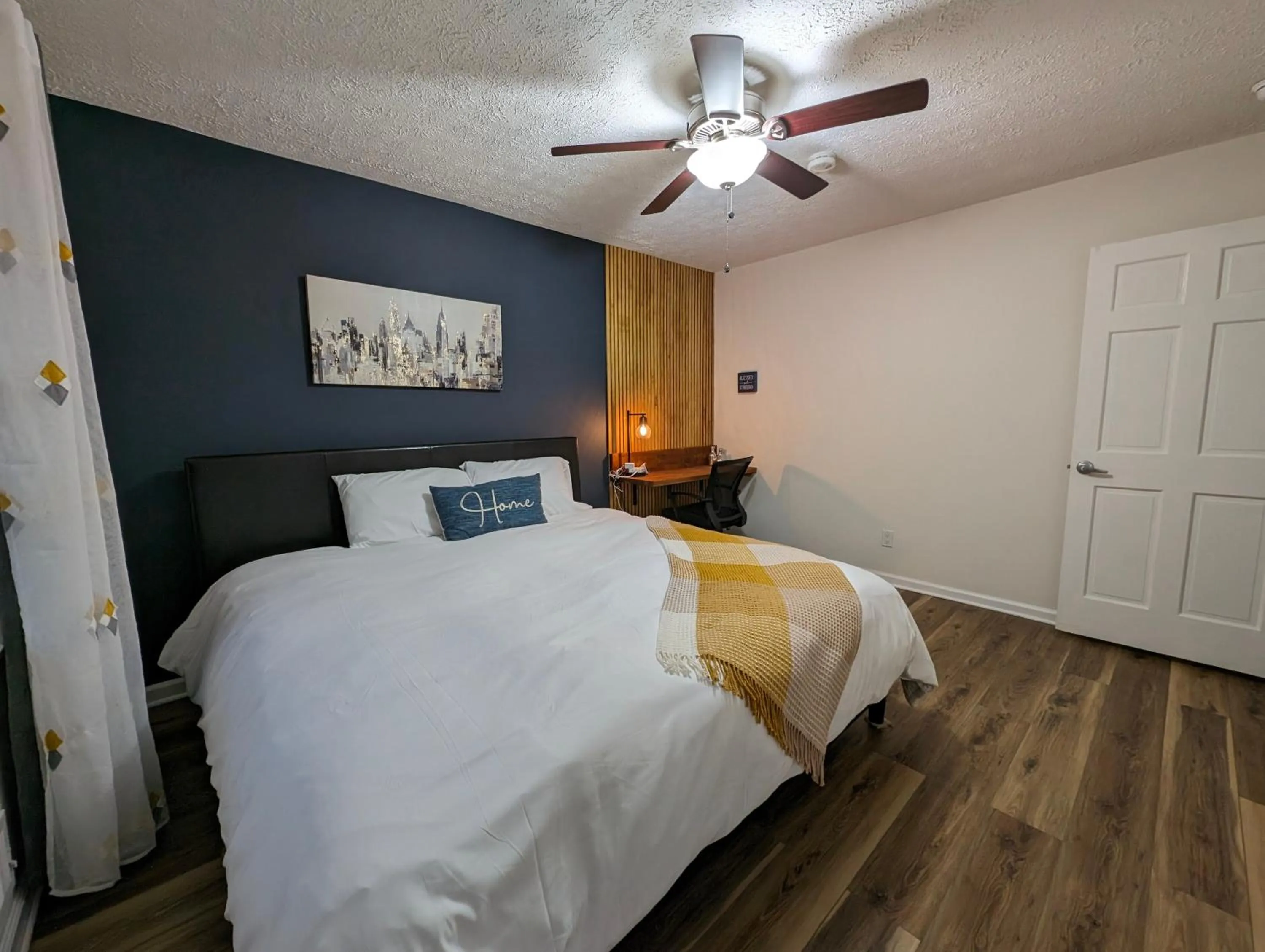 Bed in Modern Luxe Family & Groups Friendly Bungalow with Patio & Workspace