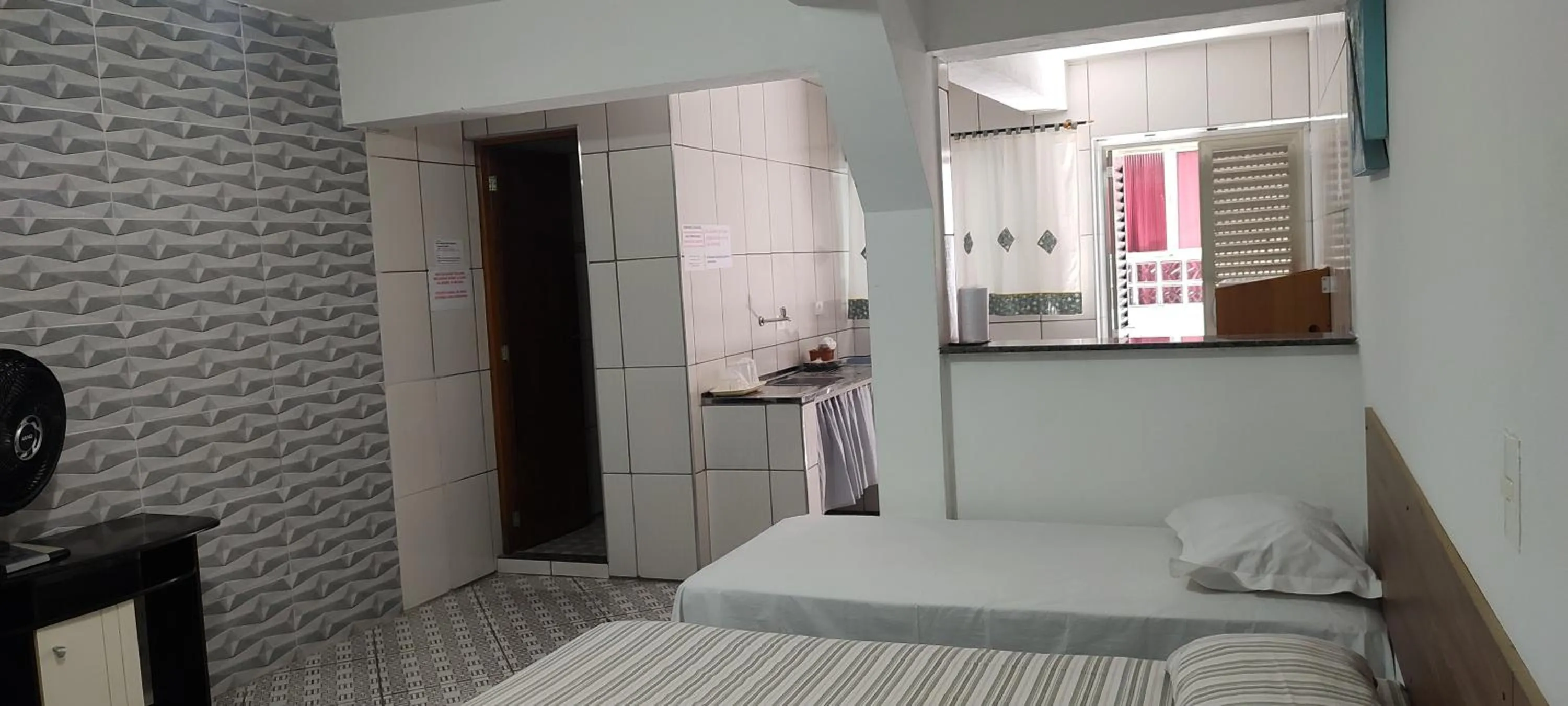 Bed in Pousada Guarulhos