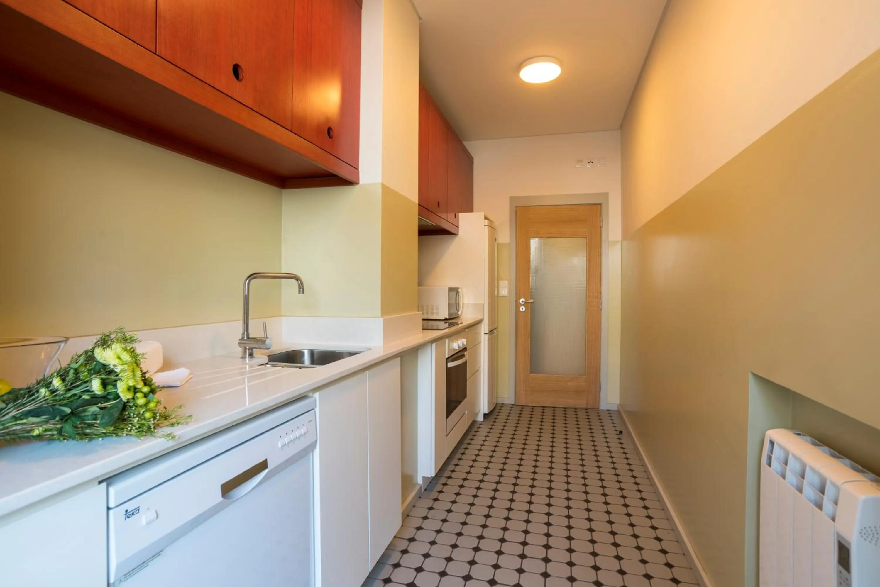 Kitchen or kitchenette in bnapartments Trindade