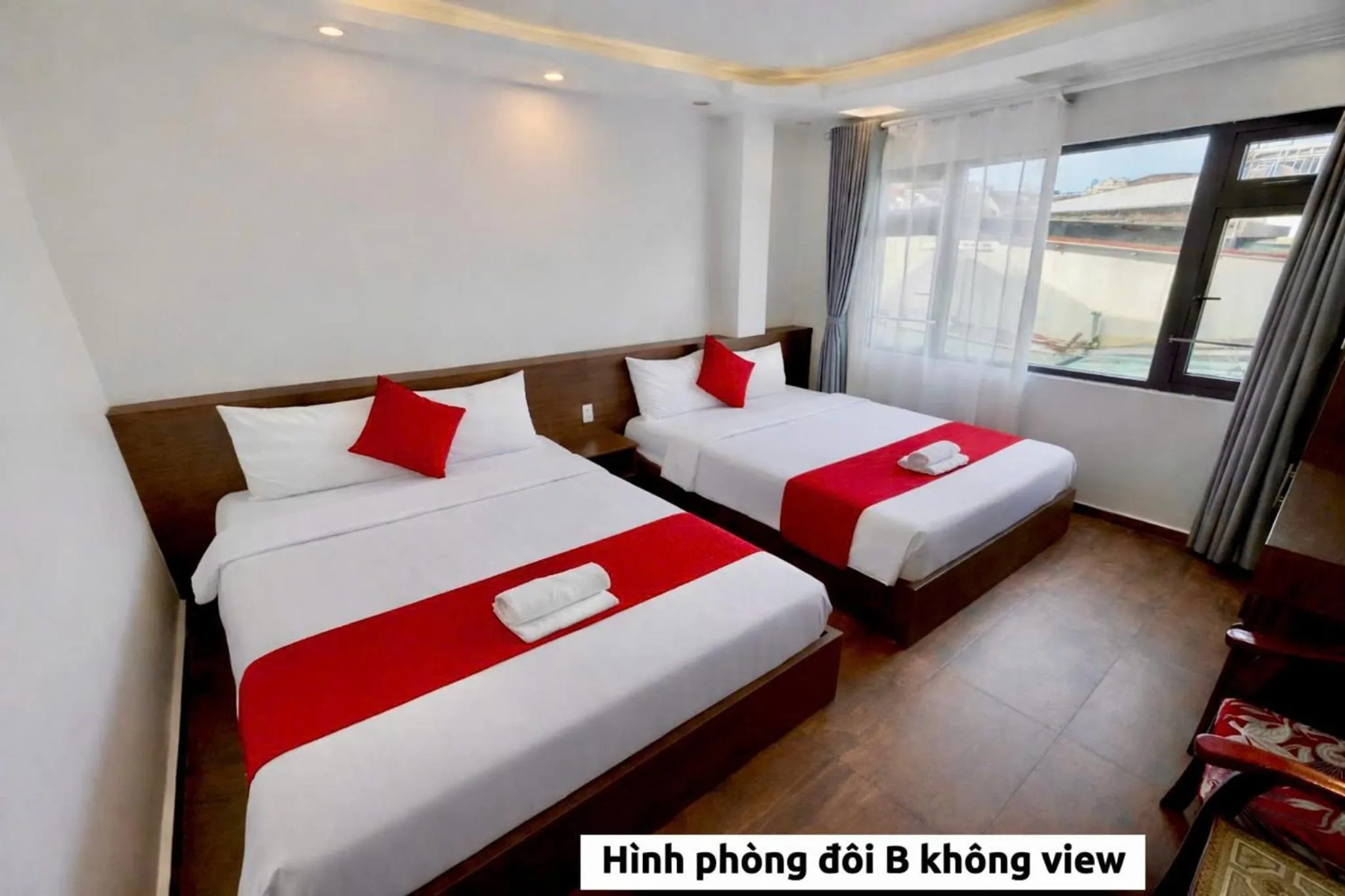 Photo of the whole room, Bed in Le Tuan Minh Hotel