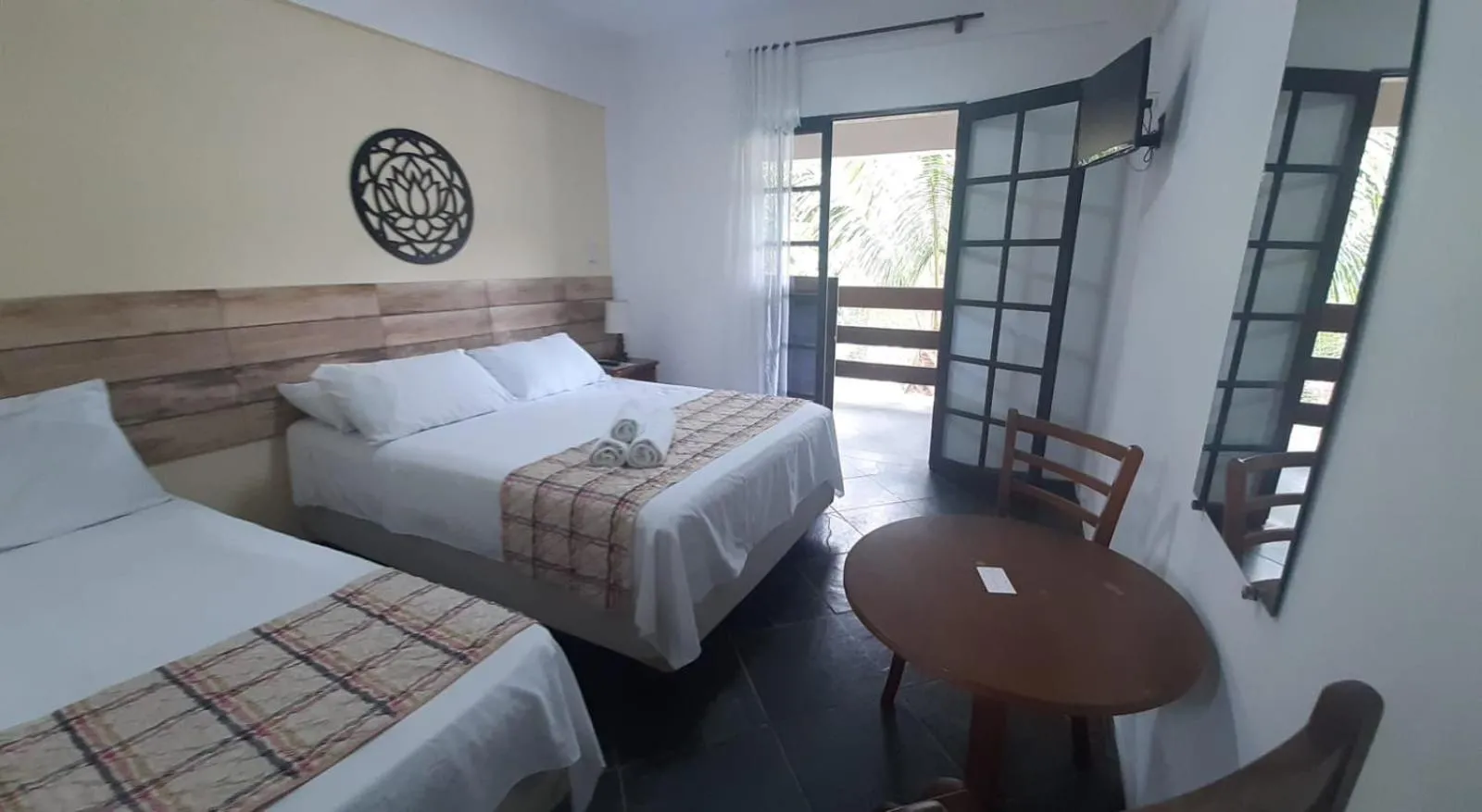 Bed in Pousada Mari