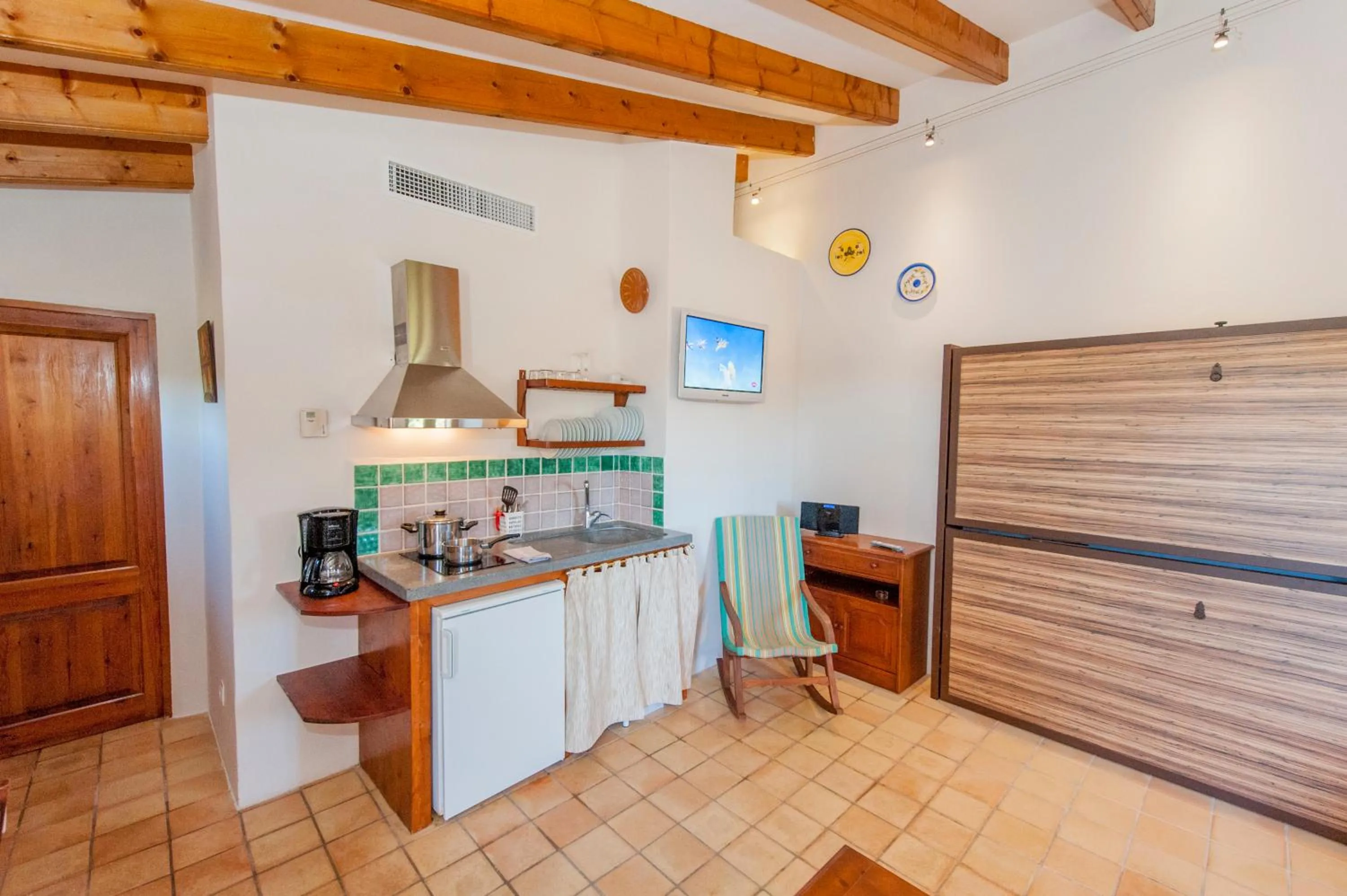 Kitchen or kitchenette in Finca Hotel Ses Cases Noves