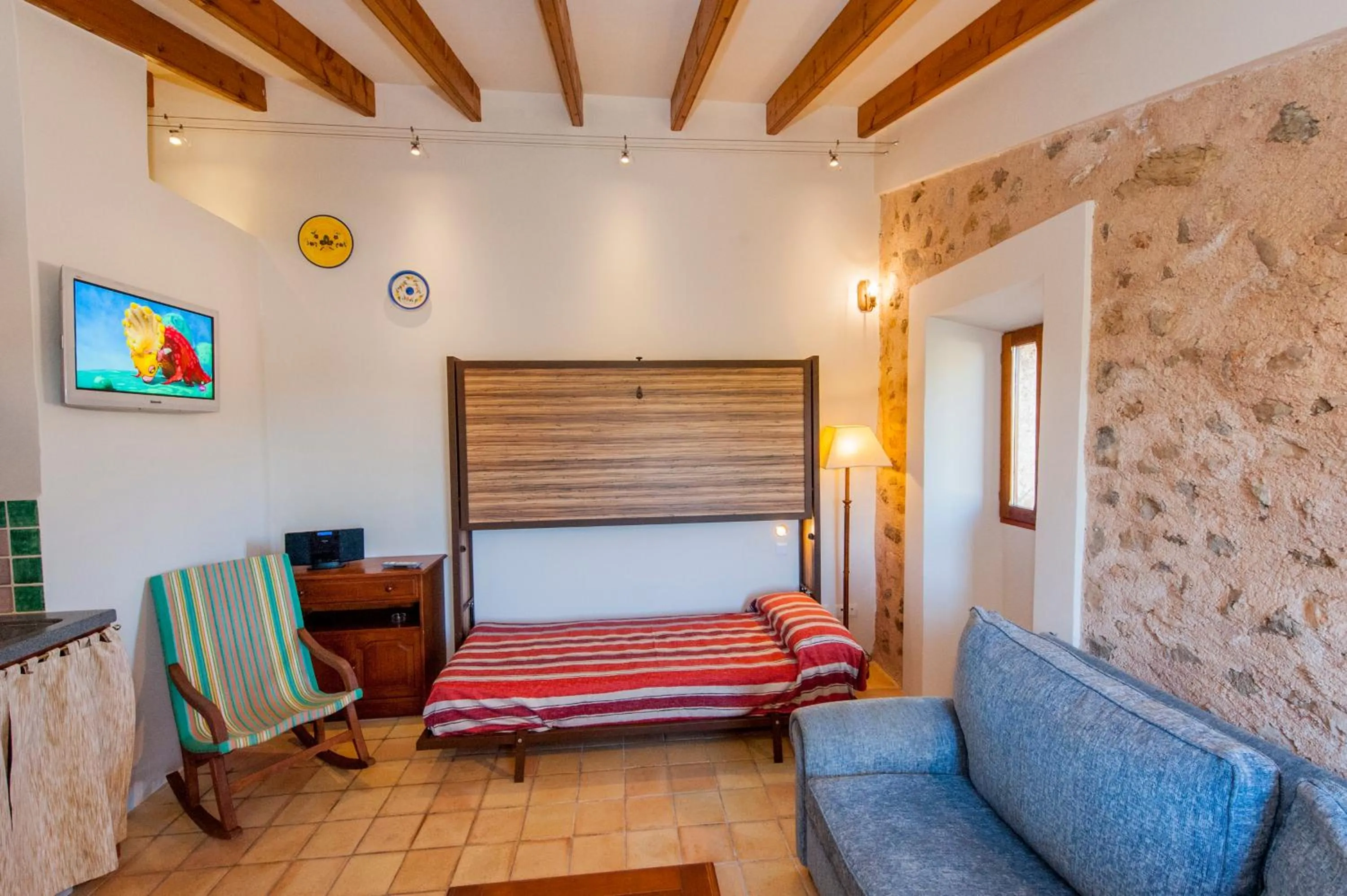 Living room, Bed in Finca Hotel Ses Cases Noves