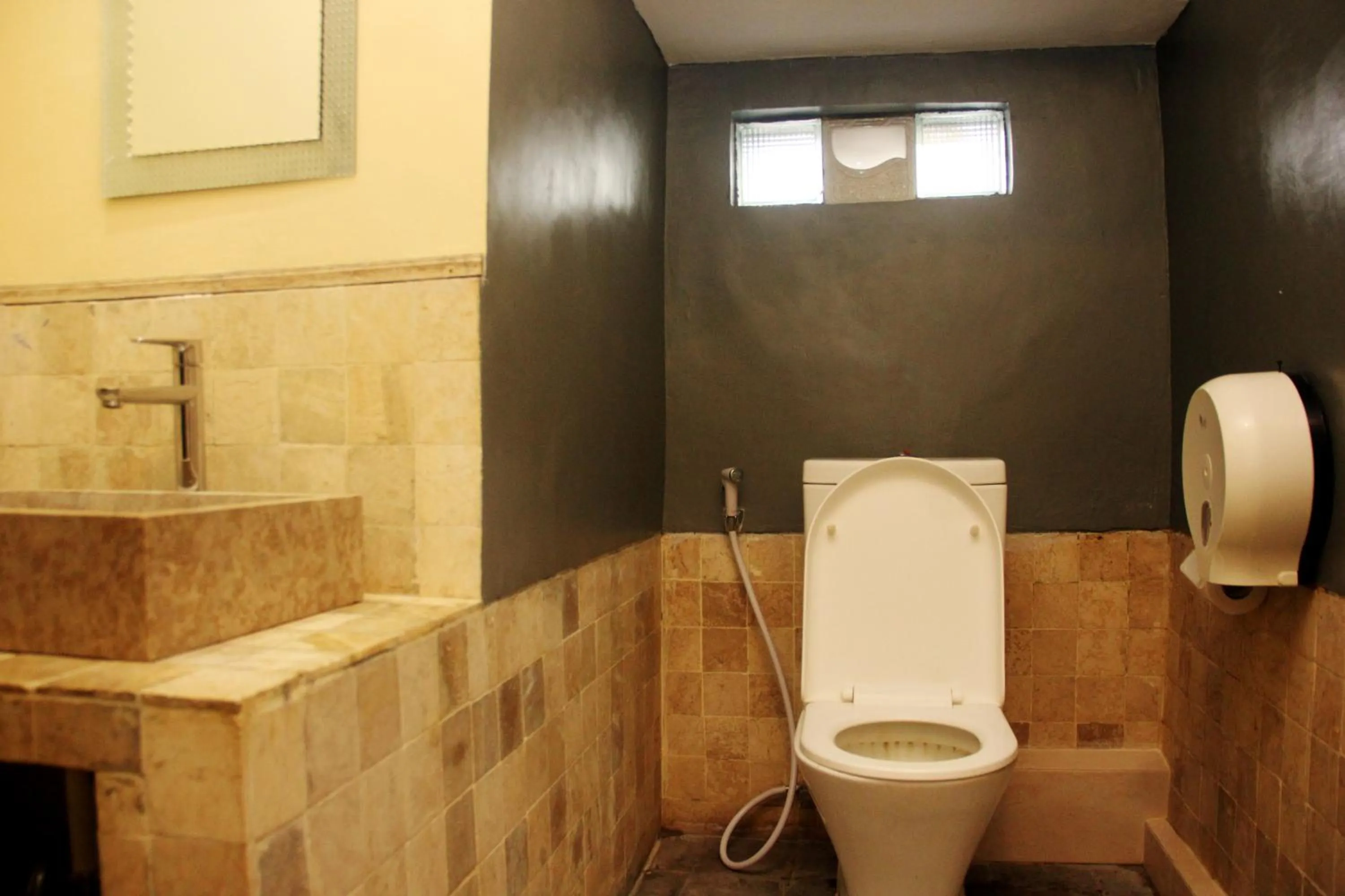 Toilet in ALA Hostel