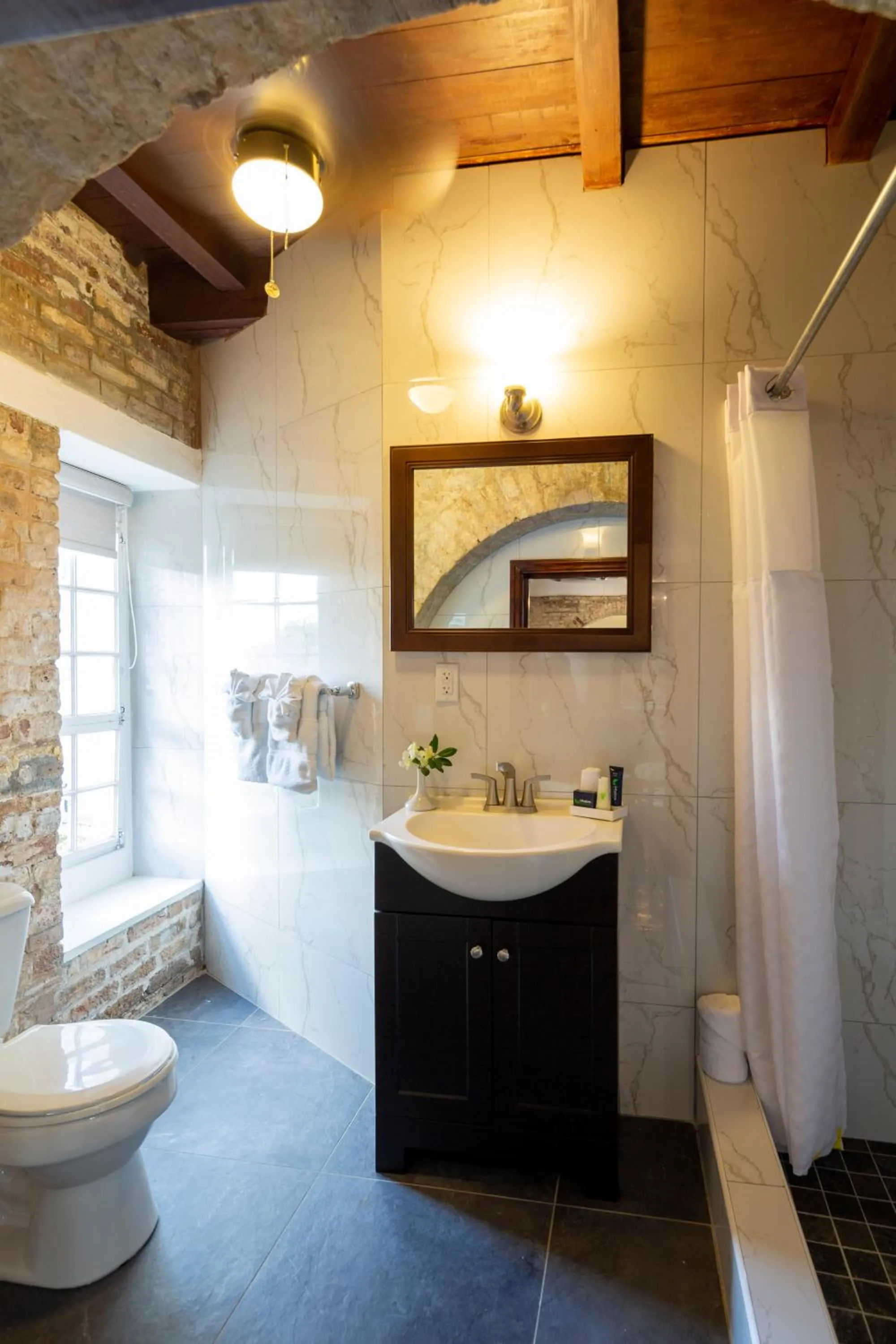 Shower in Copper and Lumber Store Hotel